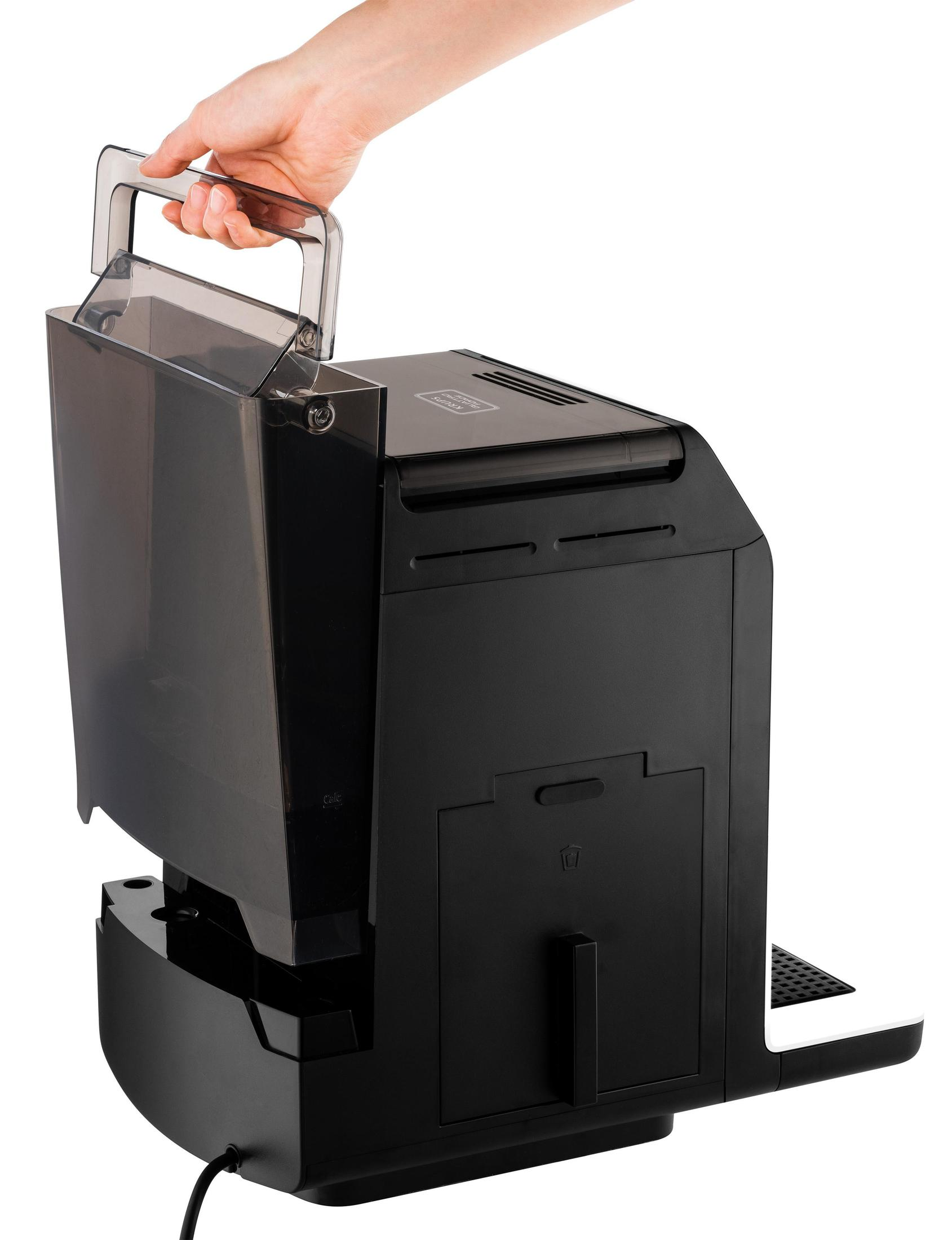 Macchina da caffè nera con una persona che solleva un serbatoio d'acqua.