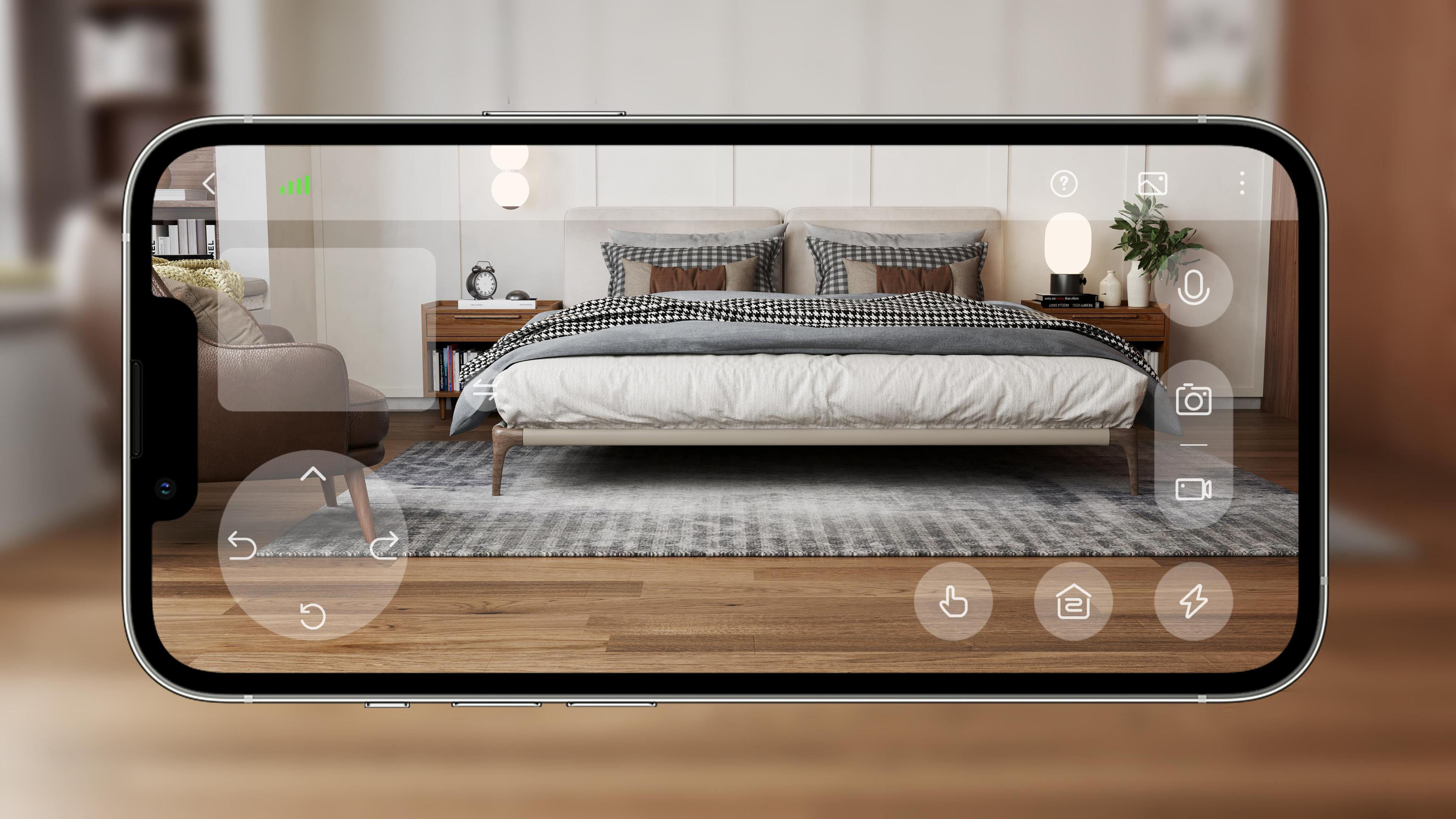Smartfon wyświetla scenę z sypialni. Pokój ma łóżko, szafki nocne i dywan.
