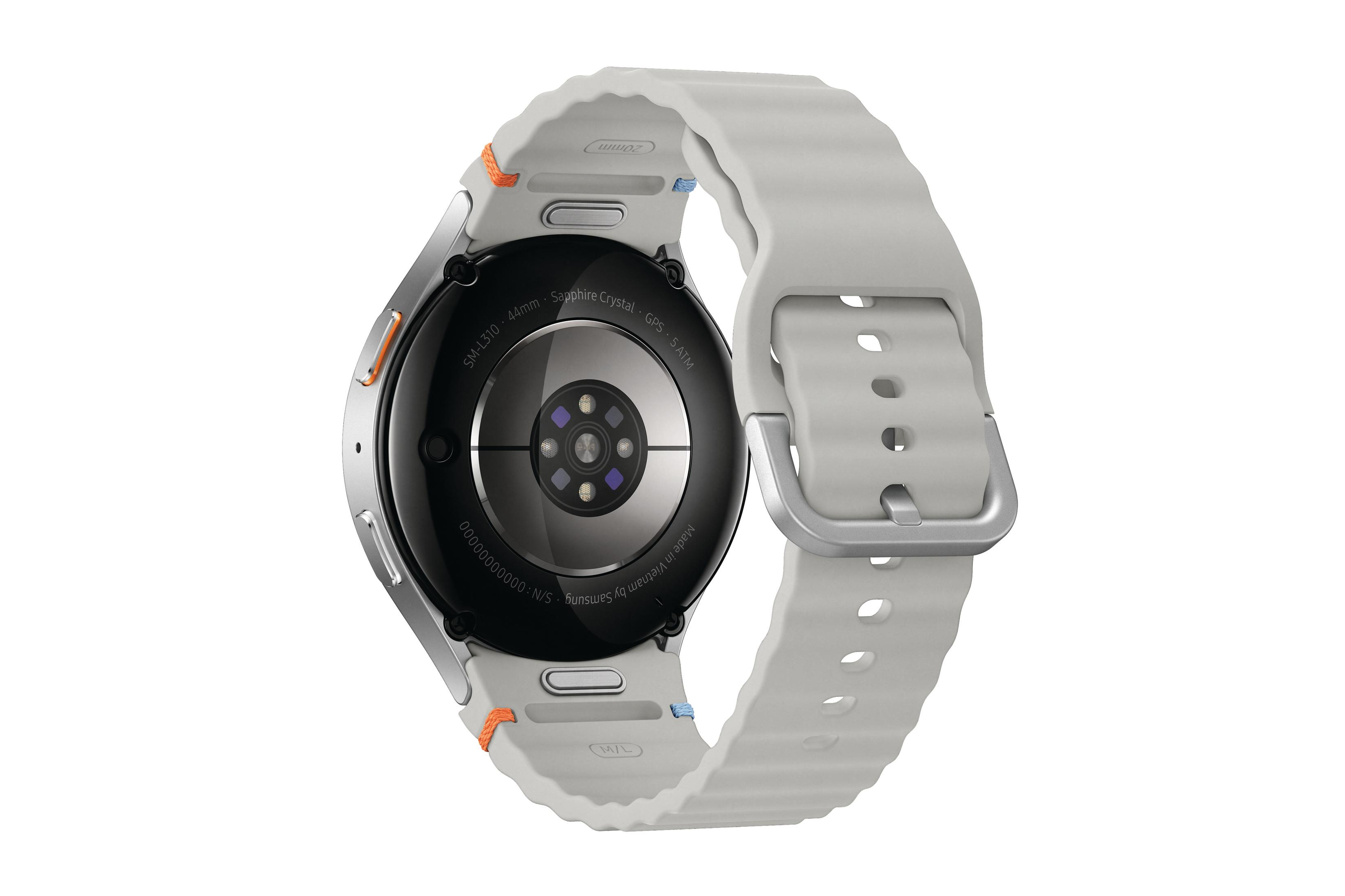 Zilveren smartwatch achteraanzicht. Het horloge heeft een witte band en sensoren.