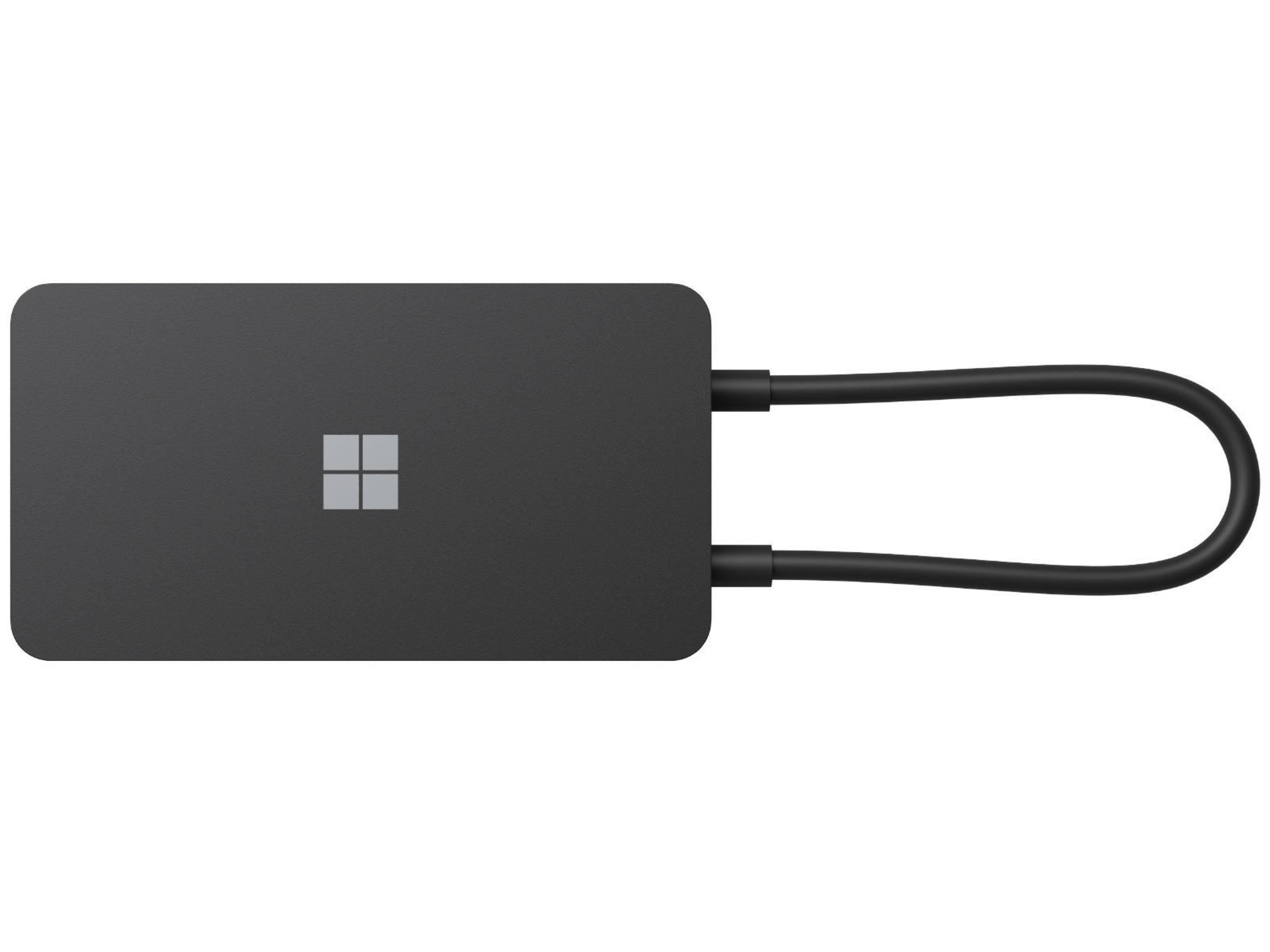 Ein schwarzer Microsoft Hub mit Microsoft-Logo und schwarzem Kabel.
