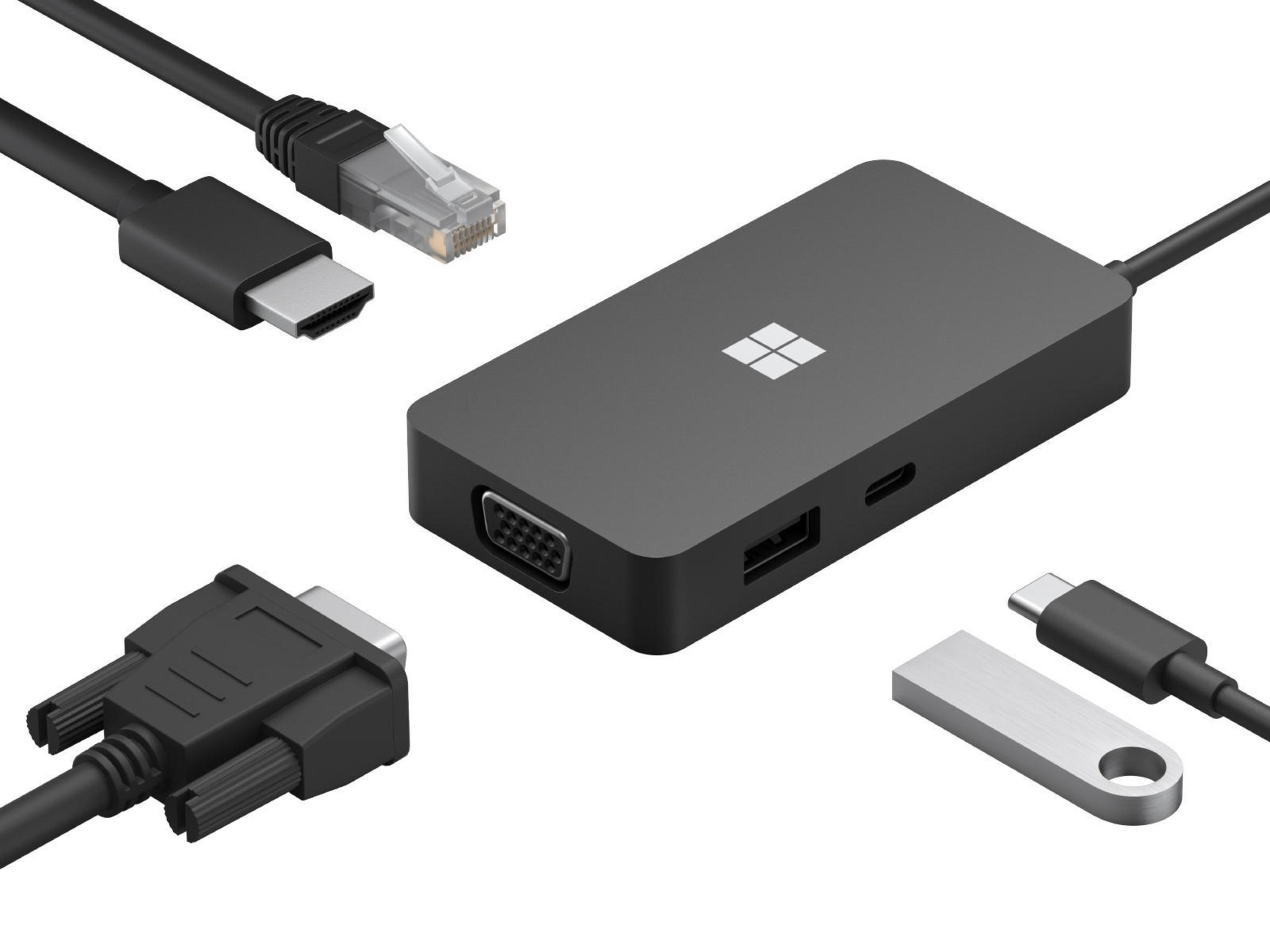 Schwarzer Hub mit Anschlüssen, HDMI-, USB- und VGA-Kabeln. Weißer Hintergrund, silberner USB-Stick.