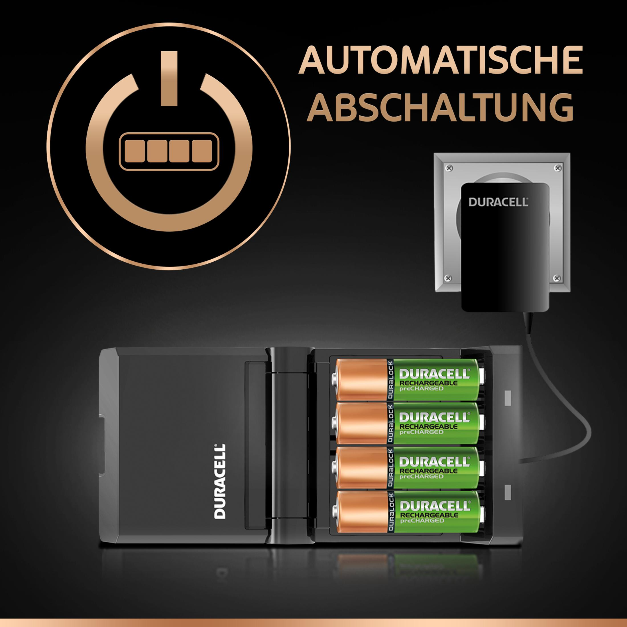 Duracell-Ladegerät mit Batterien und Netzstecker, auf schwarzem Hintergrund.