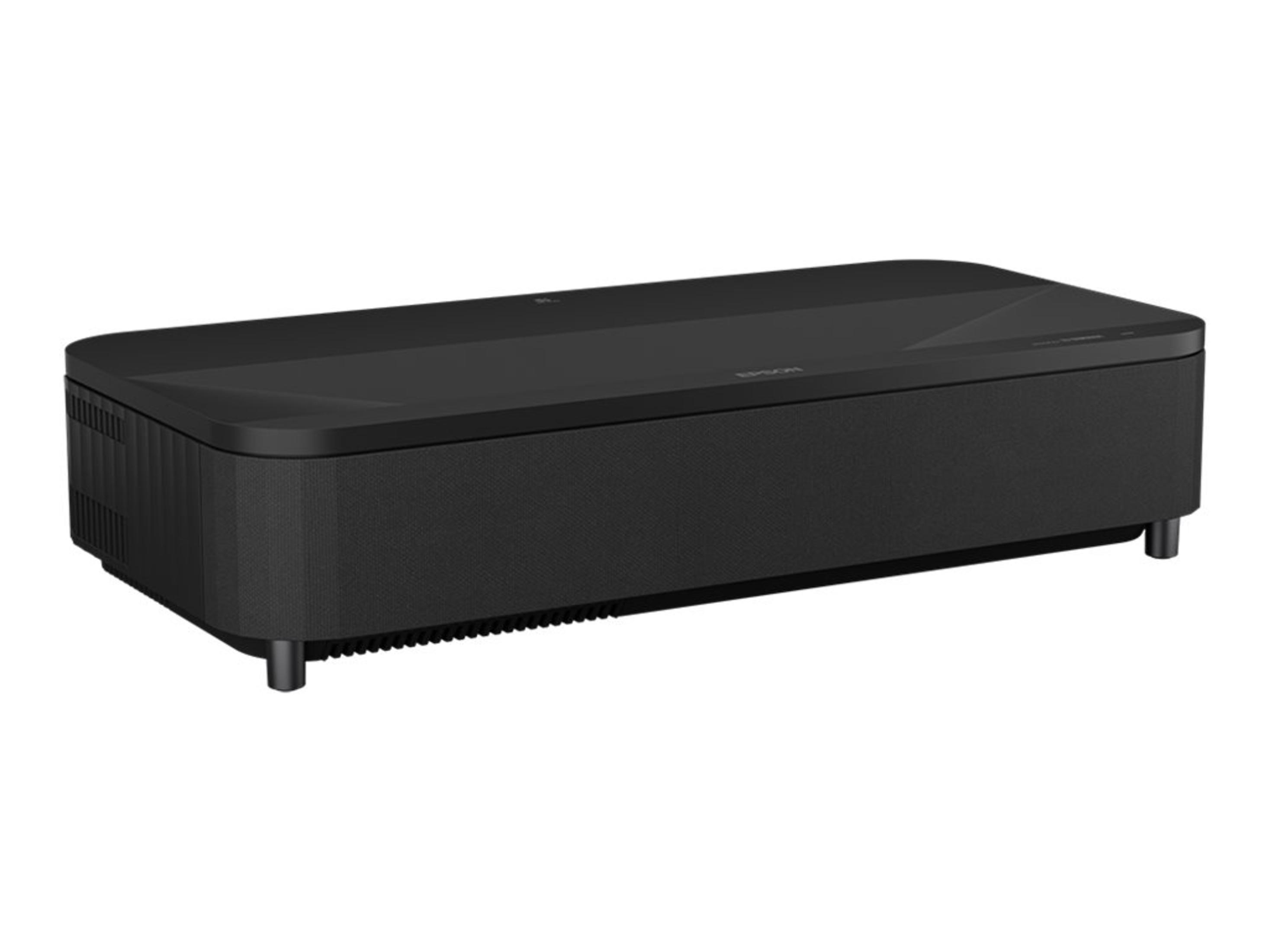Projecteur rectangulaire noir sur une surface blanche. Le projecteur a un design élégant.