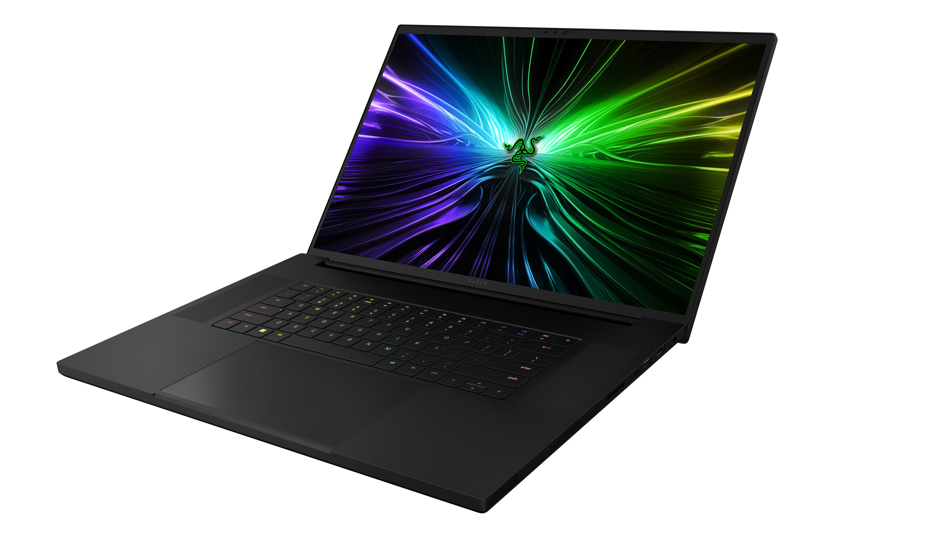 Ein schwarzer Laptop. Der Bildschirm zeigt eine farbenfrohe Grafik. Razer-Logo auf dem Display.