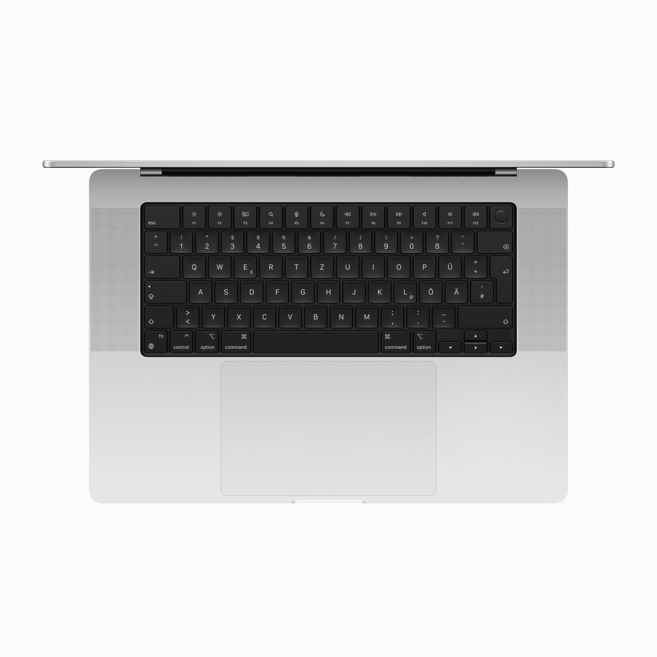 Laptop-Tastatur, Draufsicht, mit silbernem Rahmen auf weißem Grund.