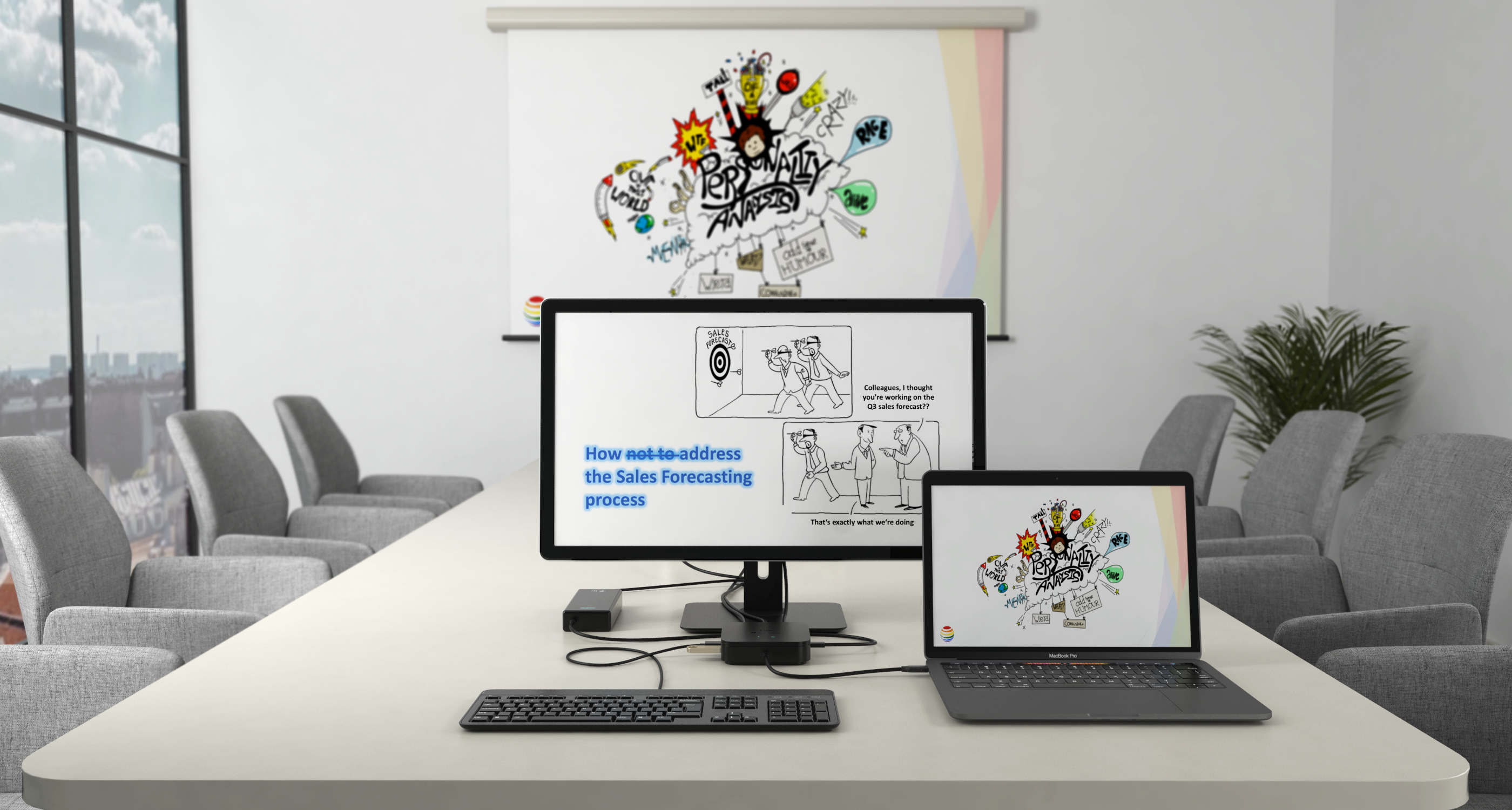 A meeting room with a large screen and a laptop displaying a presentation. A desk with a keyboard.