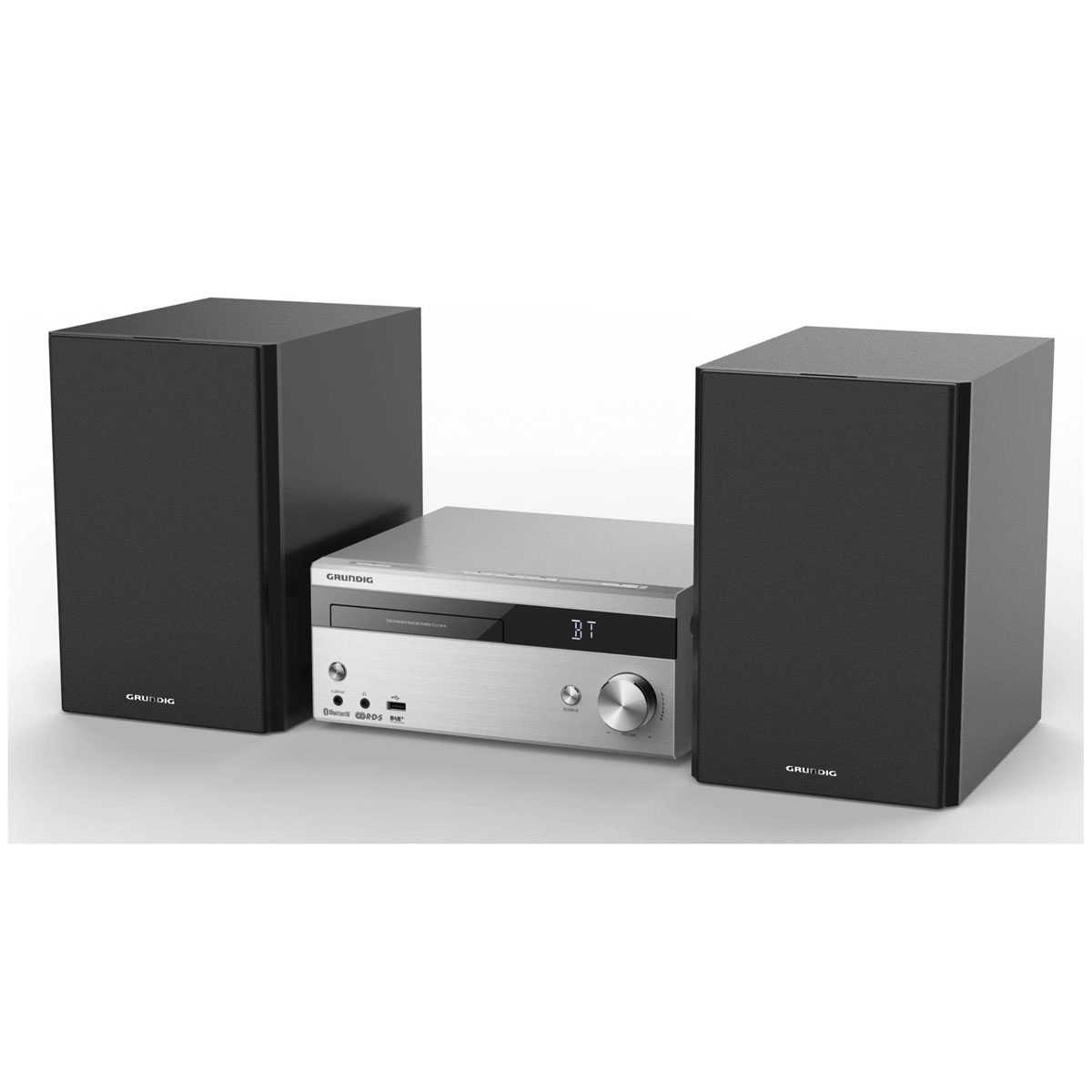 Grundig Stereoanlage mit Lautsprechern. Silberner Mediaplayer zwischen zwei schwarzen Lautsprechern.