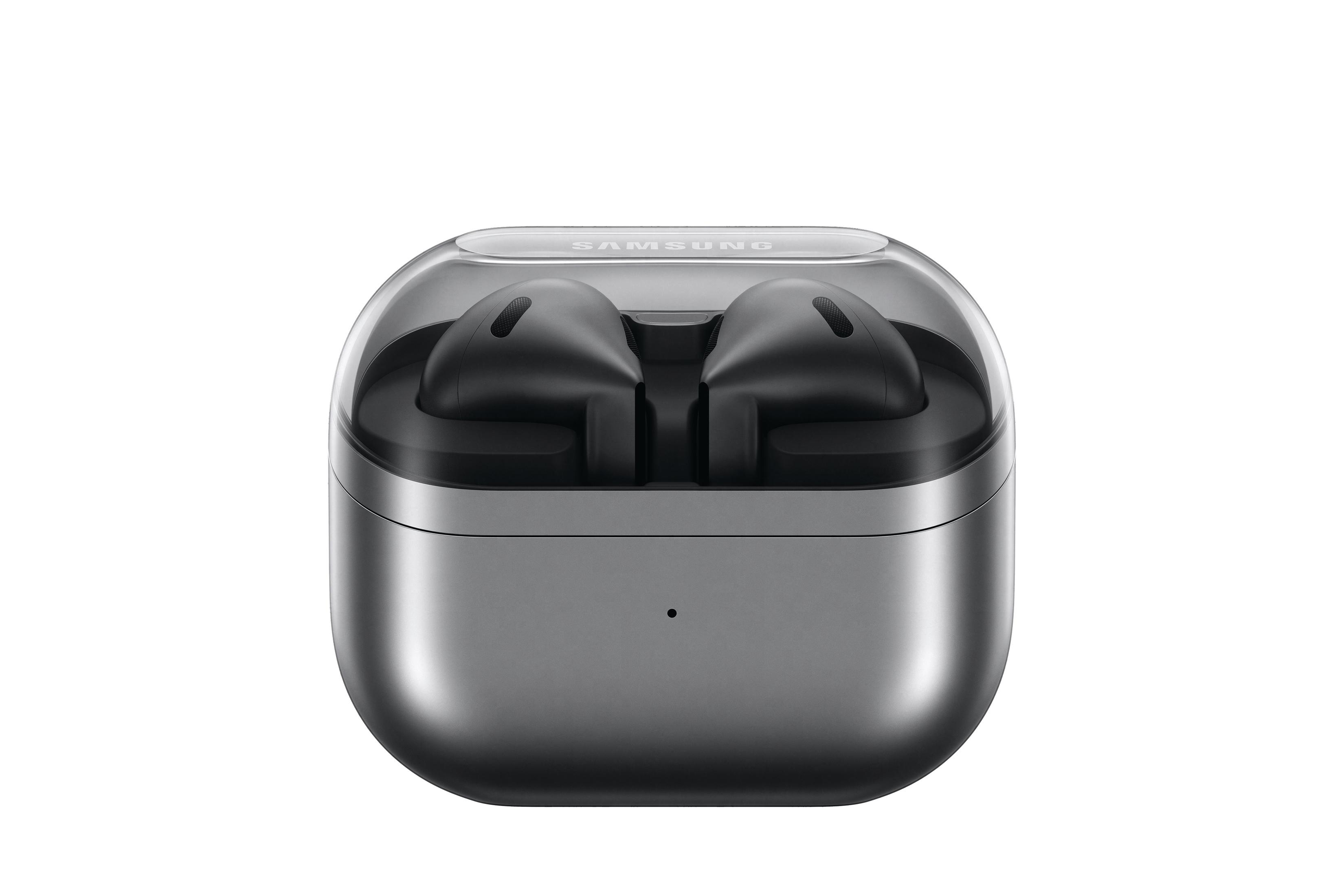 Srebrne słuchawki w szarej obudowie z przezroczystą pokrywą, na białym tle.