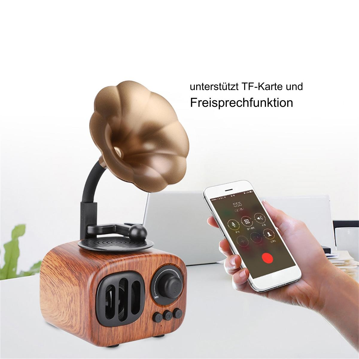 Grammofonlautsprecher aus Holz. Eine Hand hält ein Telefon.
