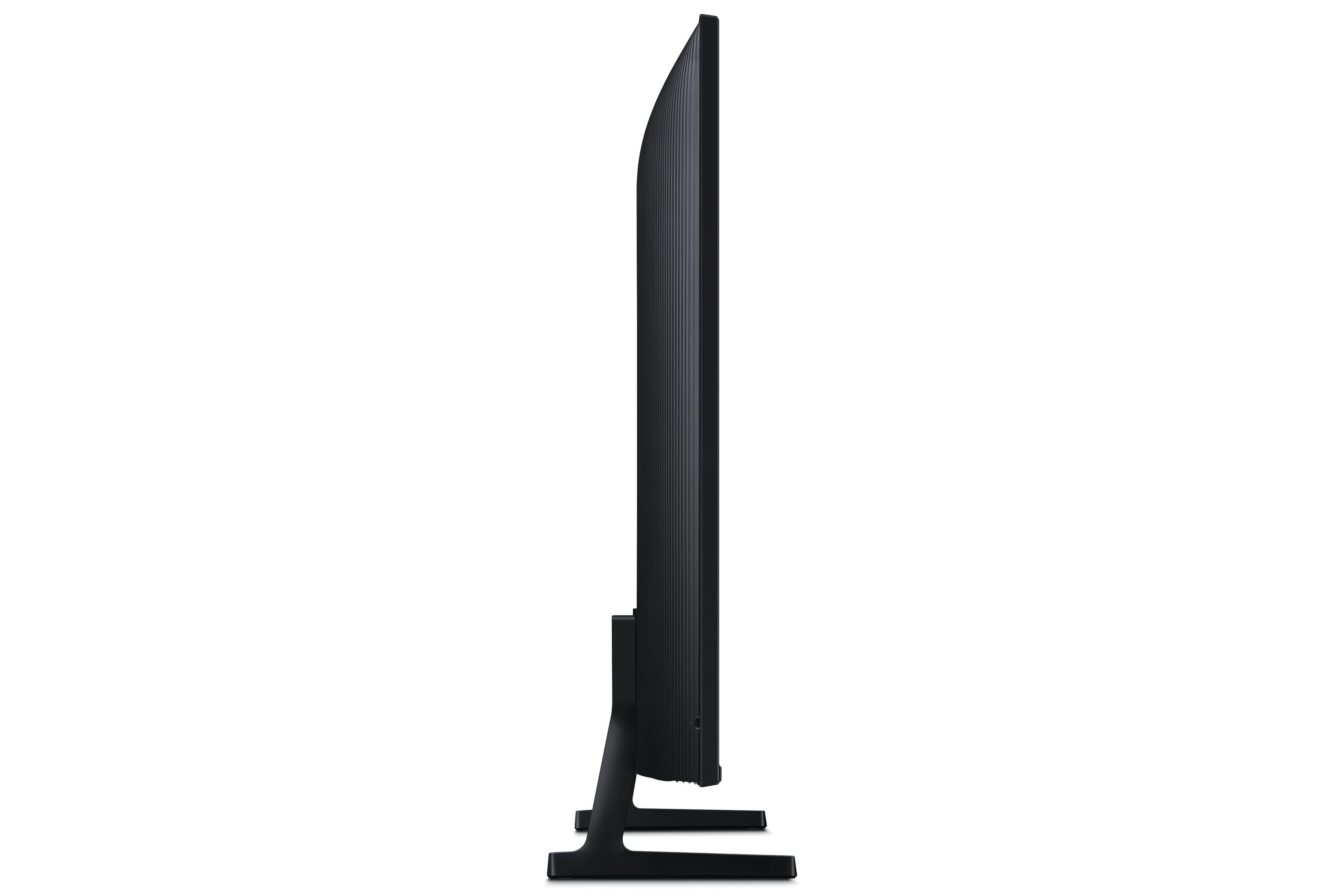 Czarny telewizor Samsung, widok z boku. Pokazuje smukły profil. Białe tło.