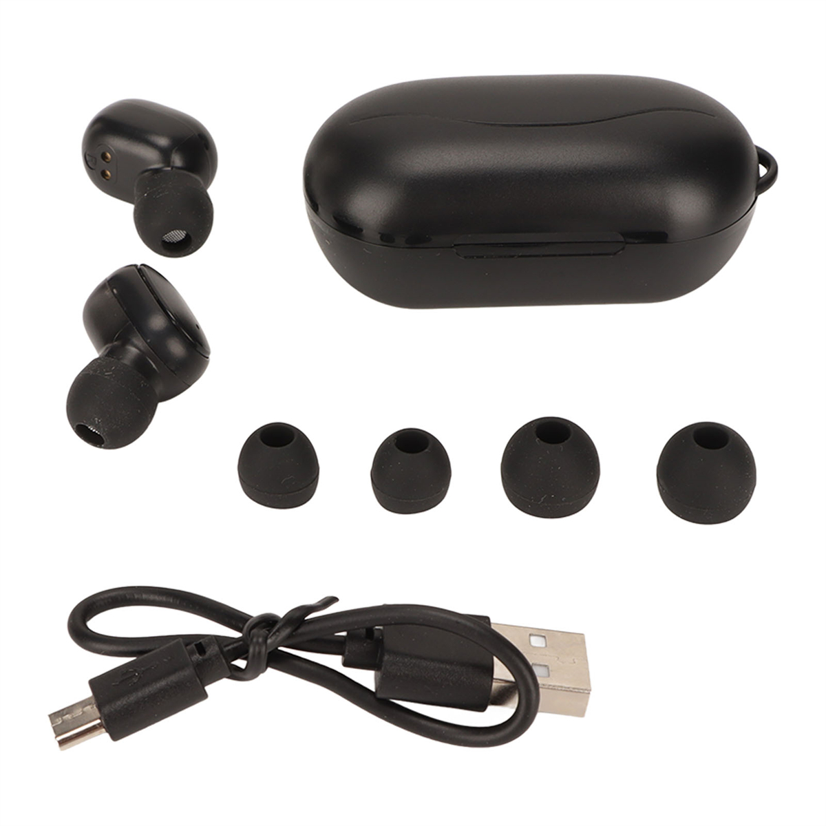 Schwarze Ohrhörer, Ladeetui und zusätzliche Ohrstöpsel mit USB-Kabel.