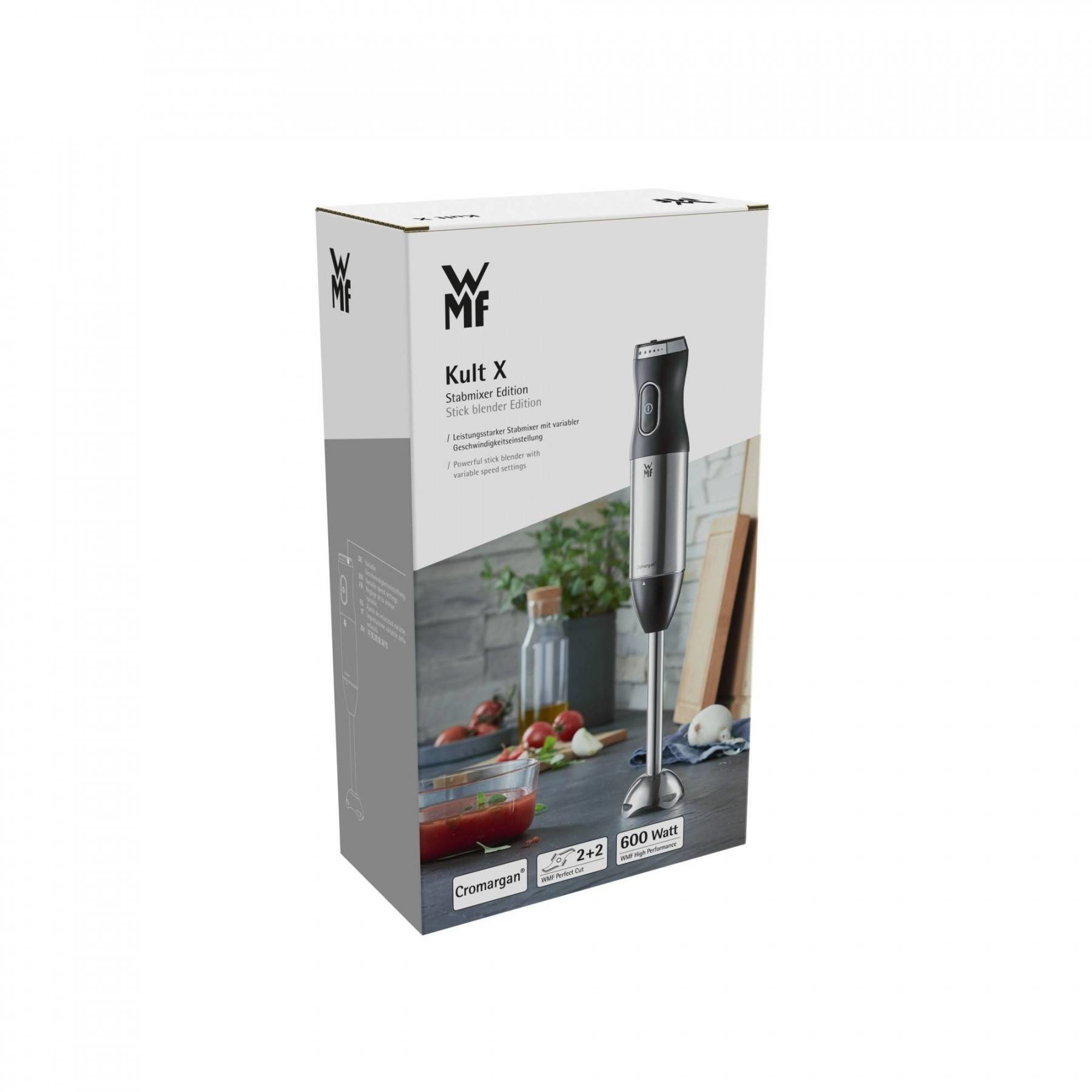 Karton eines WMF Kukt X Stabmixers. Mixstab auf schwarzer Oberfläche. Seitenansicht.