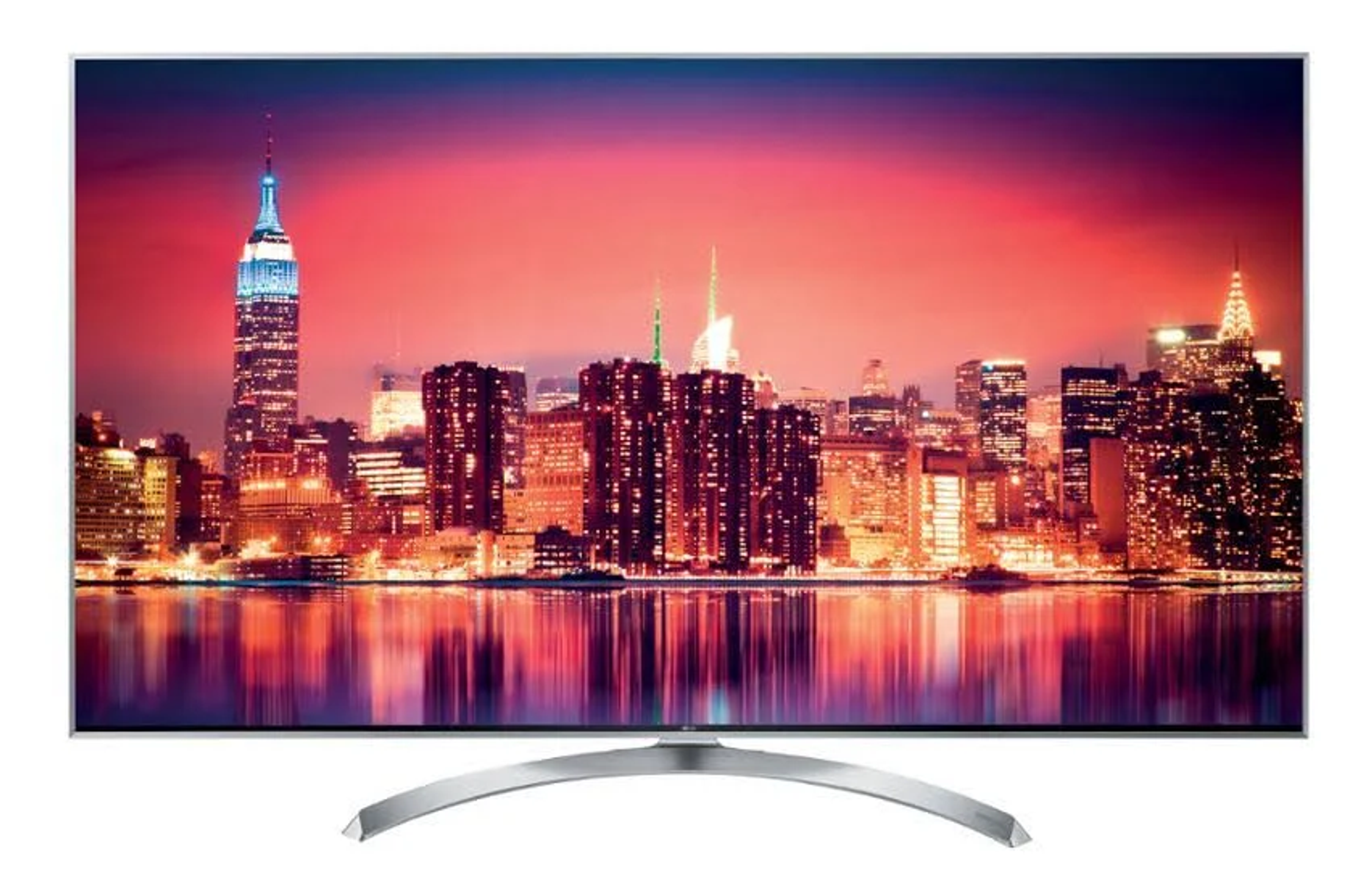 Pantalla de TV mostrando un paisaje urbano nocturno con luces brillantes.