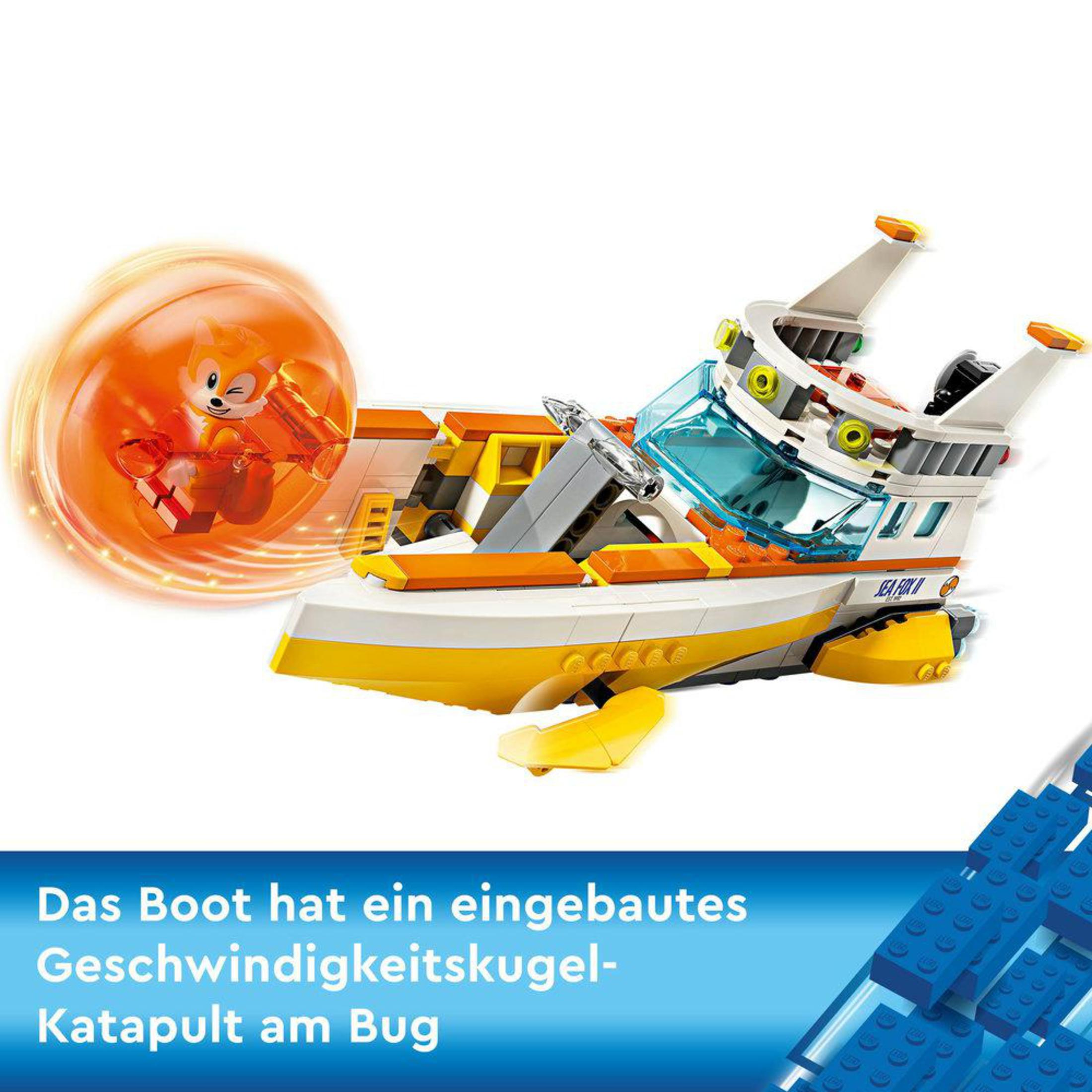 Ein Spielzeugboot mit einer Figur in einer durchsichtigen Kugel und Text auf Deutsch über das Boot.