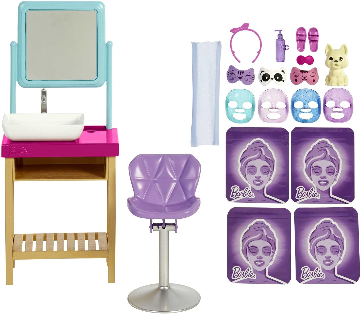 Set spa per bambini con vari articoli, tra cui un lavandino, una sedia, maschere per il viso e accessori.