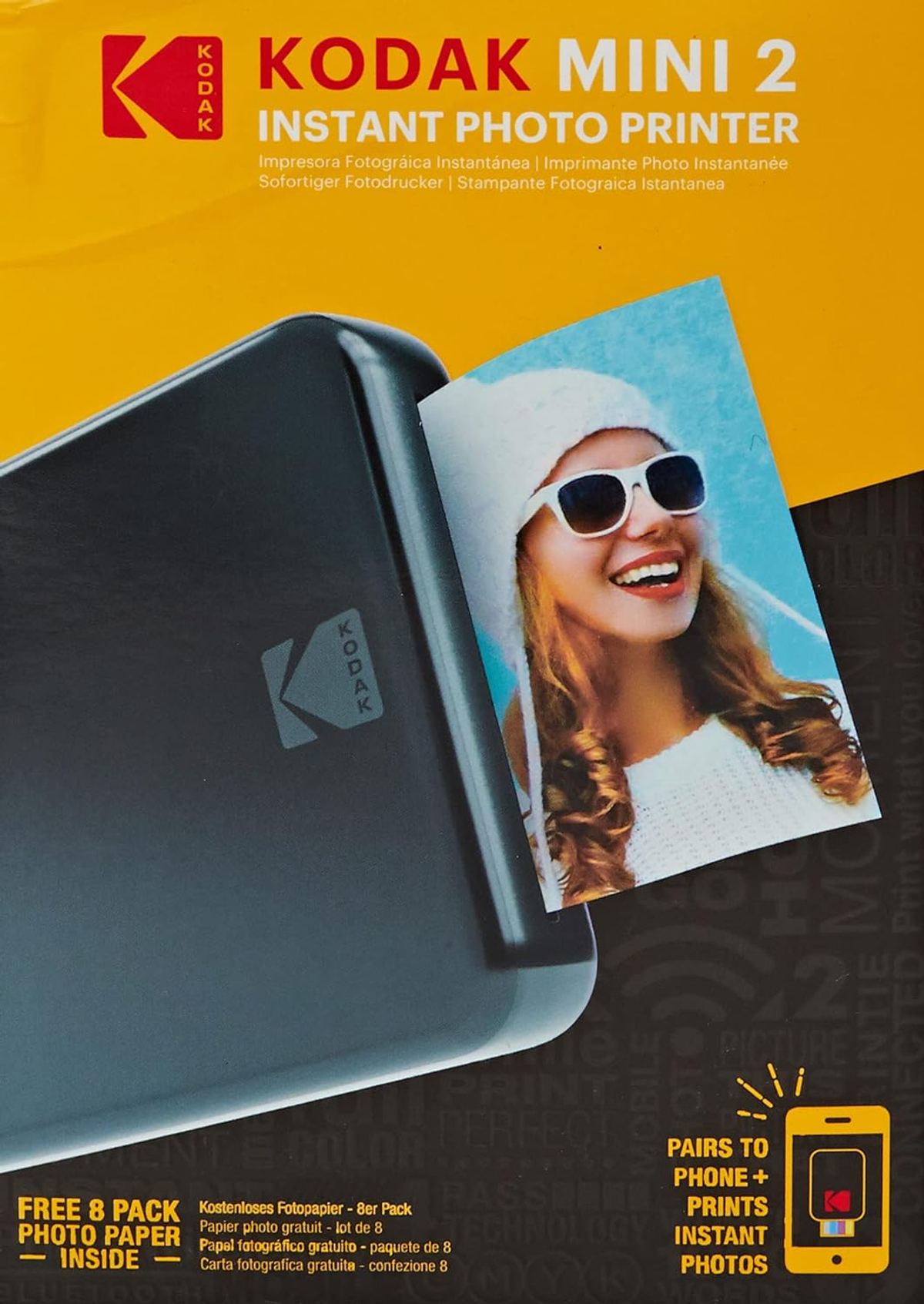 Kodak Fotodrucker-Box mit Foto einer lächelnden Frau. Gelb und schwarz.