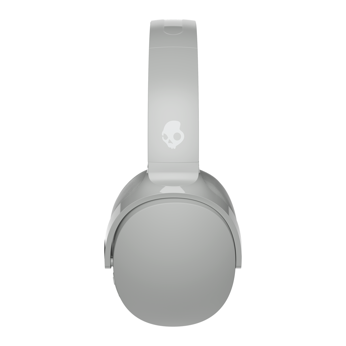 Gray Skullcandy headphones, top view, against a dark background.