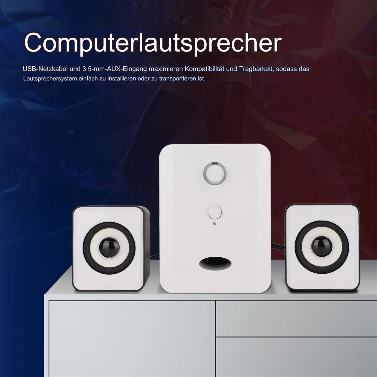 Drei weiße Lautsprecher auf einem Regal, mit einem zentralen Lautsprecher und zwei kleineren Lautsprechern auf beiden Seiten.