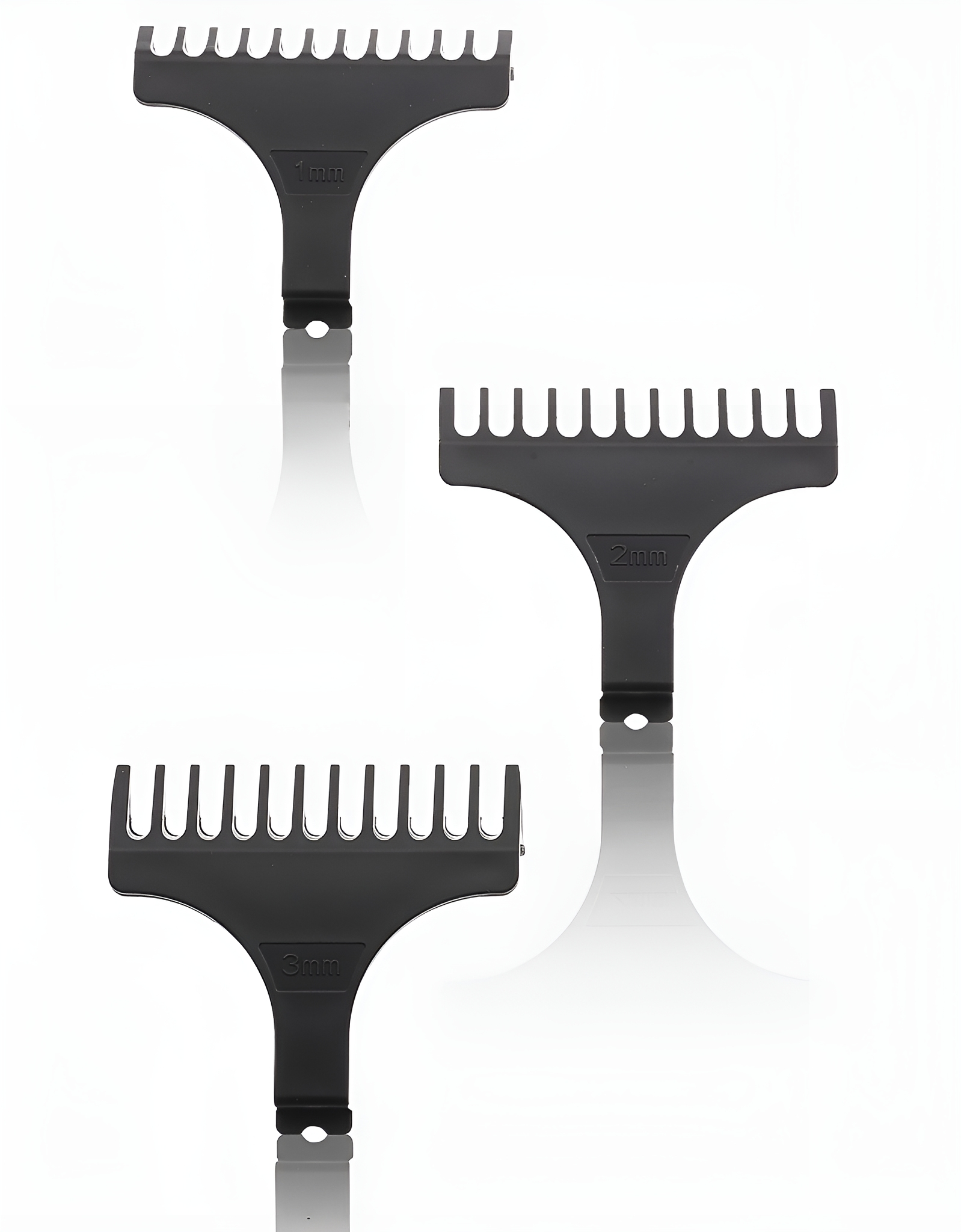 Drei schwarze Haarschneider-Aufsätze: 1 mm, 2 mm und 3 mm. Weißer Hintergrund mit Reflexionen.