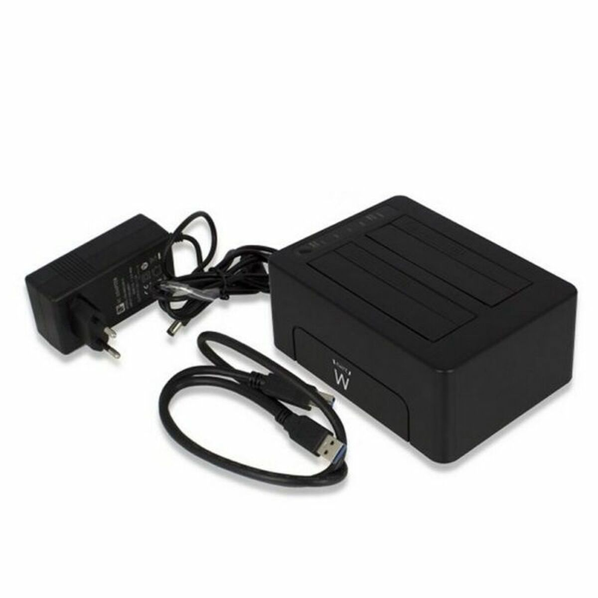 Carcasa de disco duro externo negro y cargador, con un cable USB.