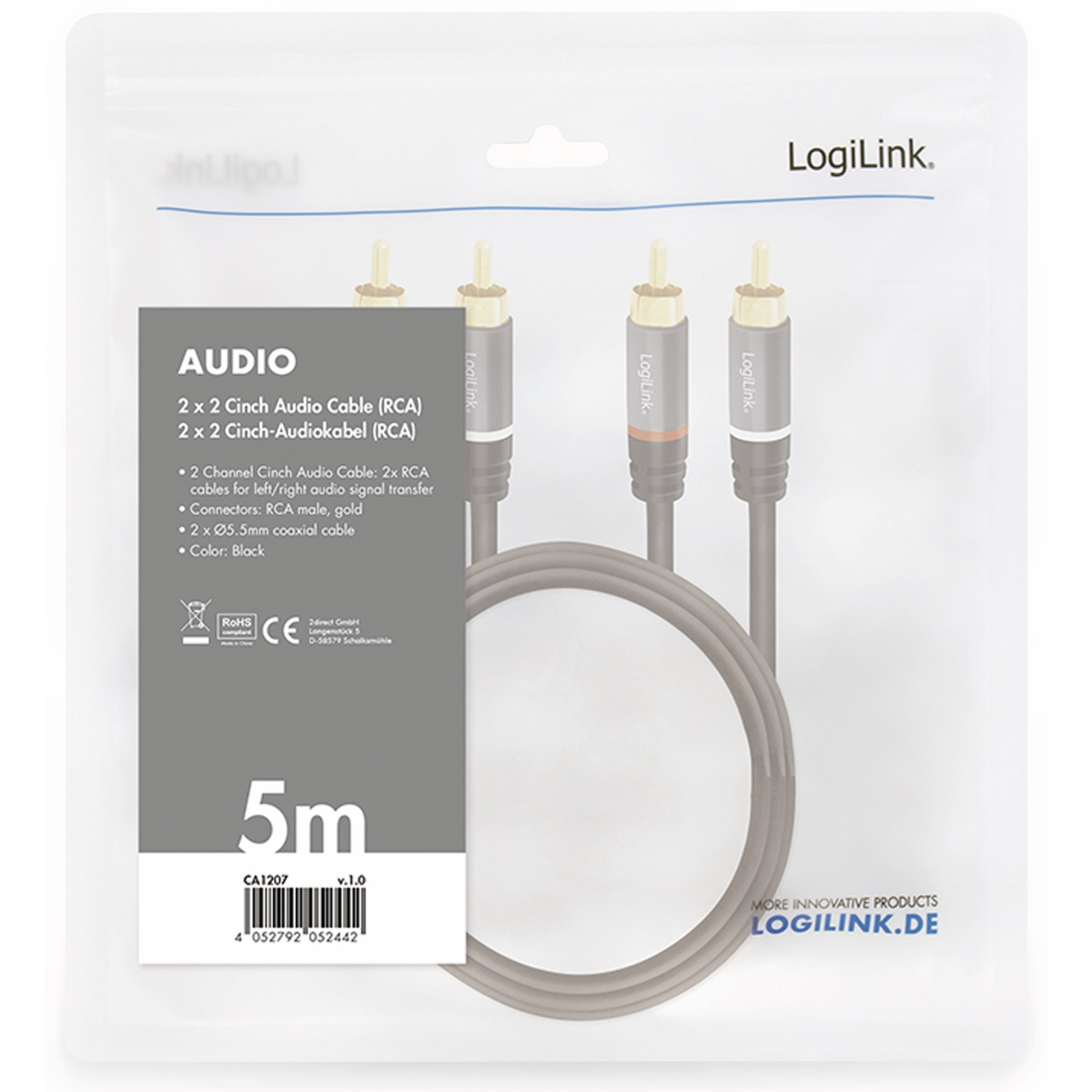 Cable de audio en bolsa de plástico. Cable negro con conectores dorados. Etiqueta gris con texto.