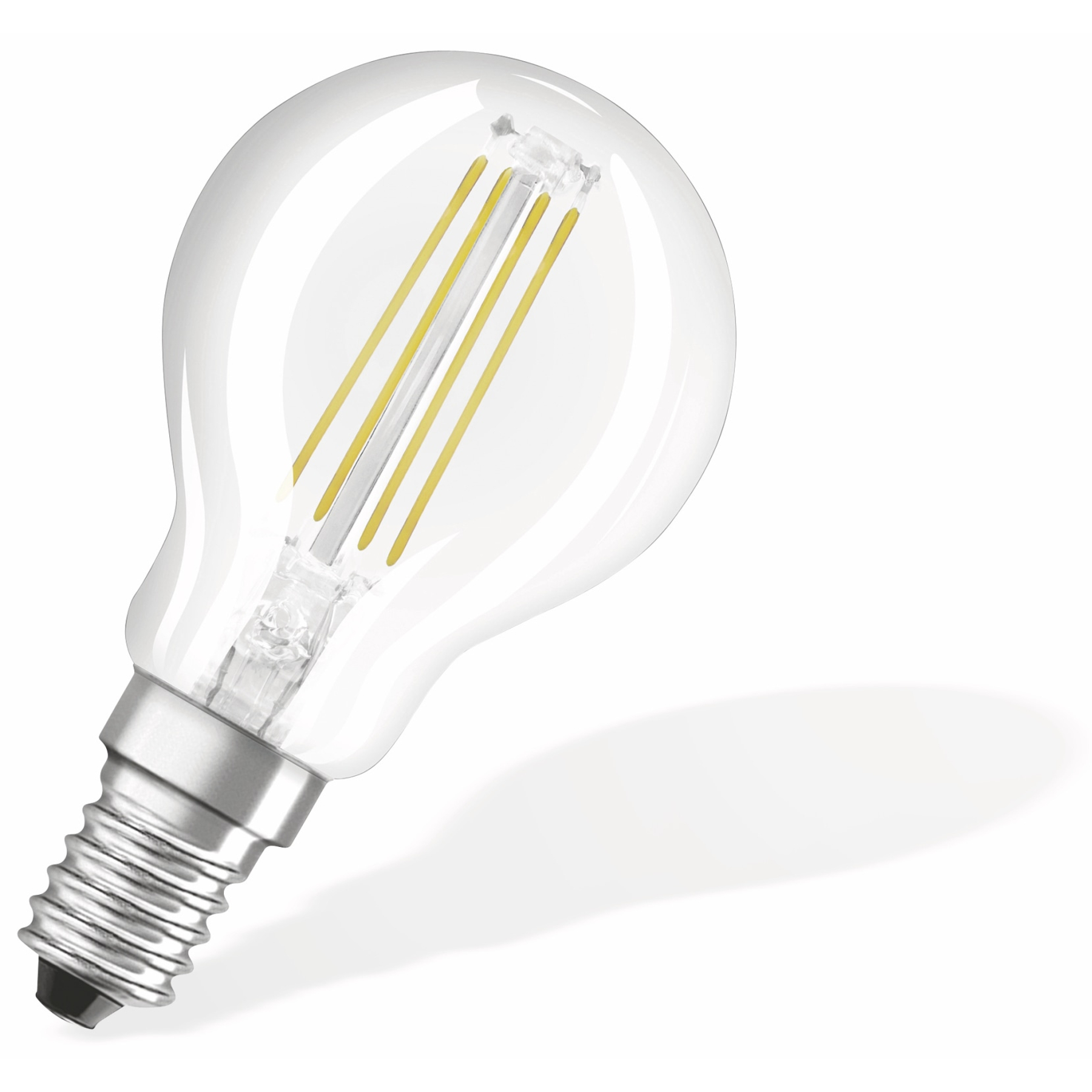 Ampoule transparente avec filaments jaunes, projetant une ombre.