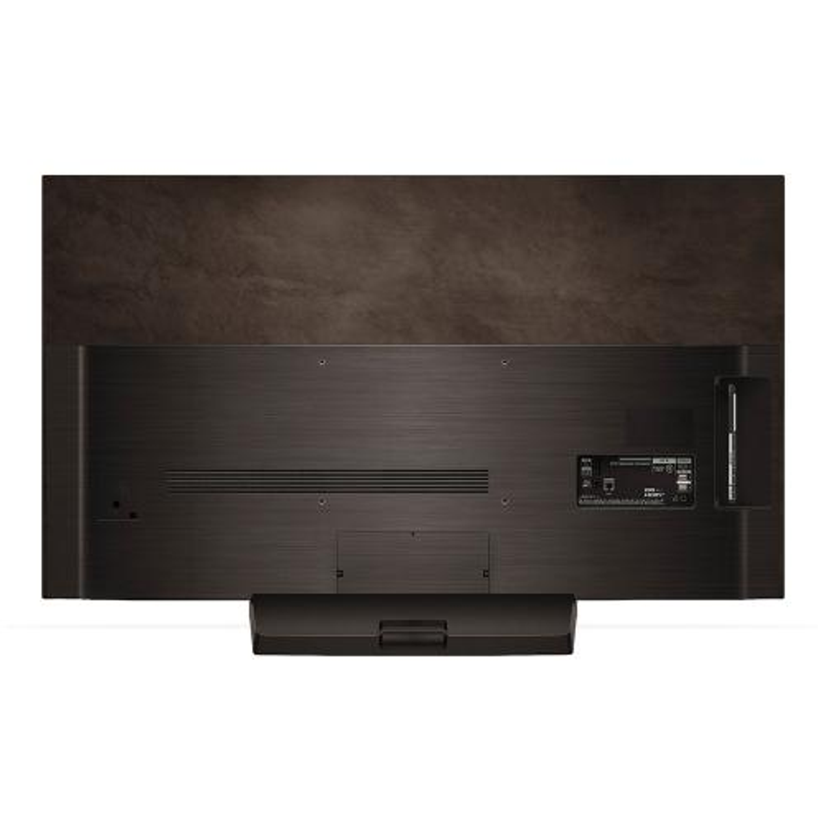 Tył czarnego telewizora. Widoczne różne porty i wejścia.