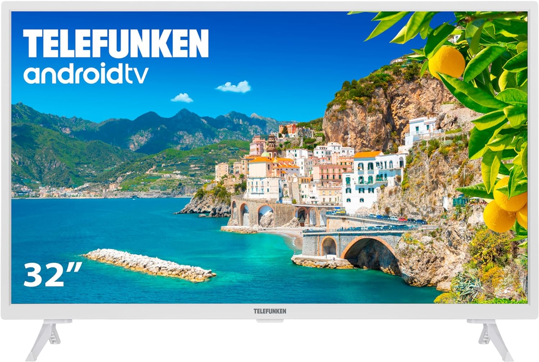 Un TELEFUNKEN Android TV blanco muestra una escena costera con montañas y cielo azul.
