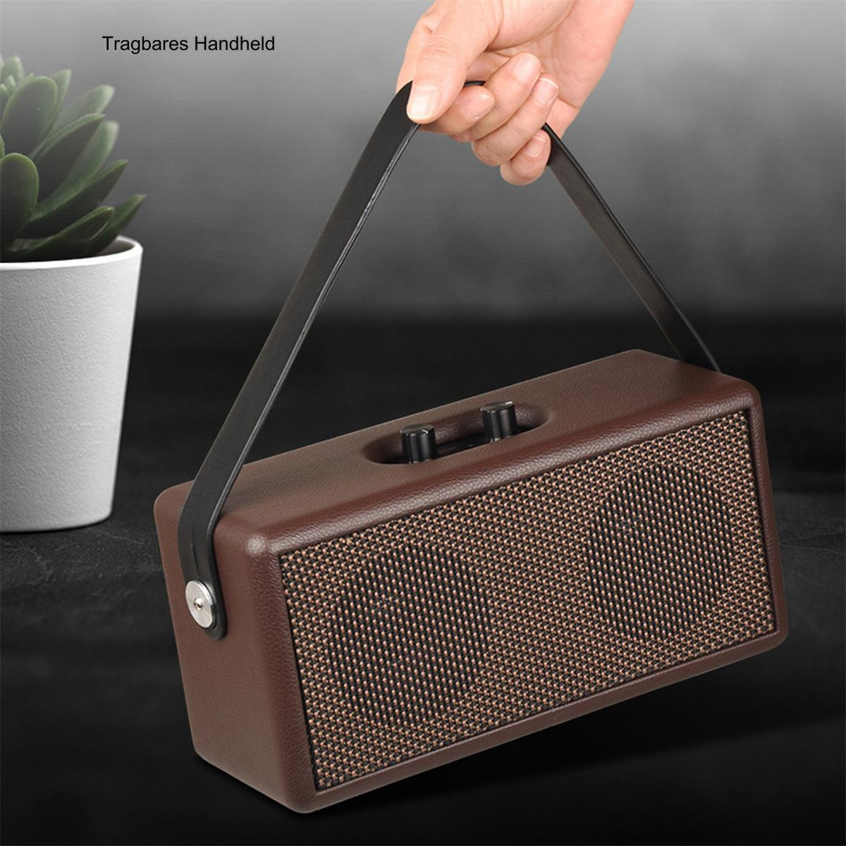 Ein brauner Lautsprecher mit Griff wird von einer Hand gehalten, die sein Front- und Top-Design zeigt.
