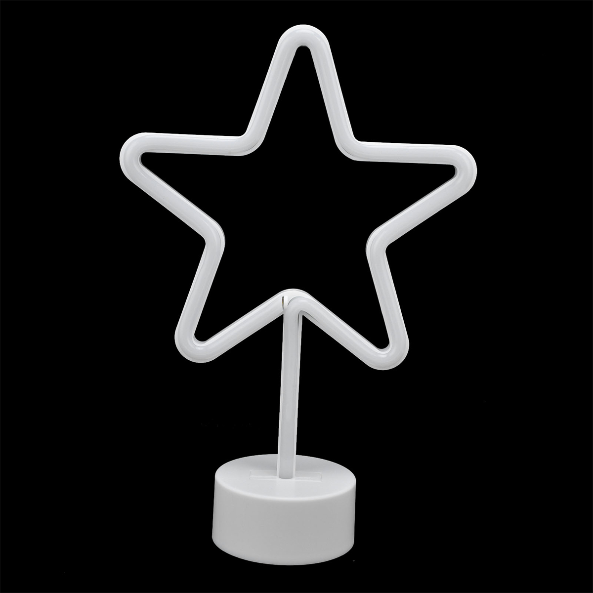 Weißes Neon-Sternschild. Es steht auf einem kleinen weißen Sockel. Der Hintergrund ist schwarz.