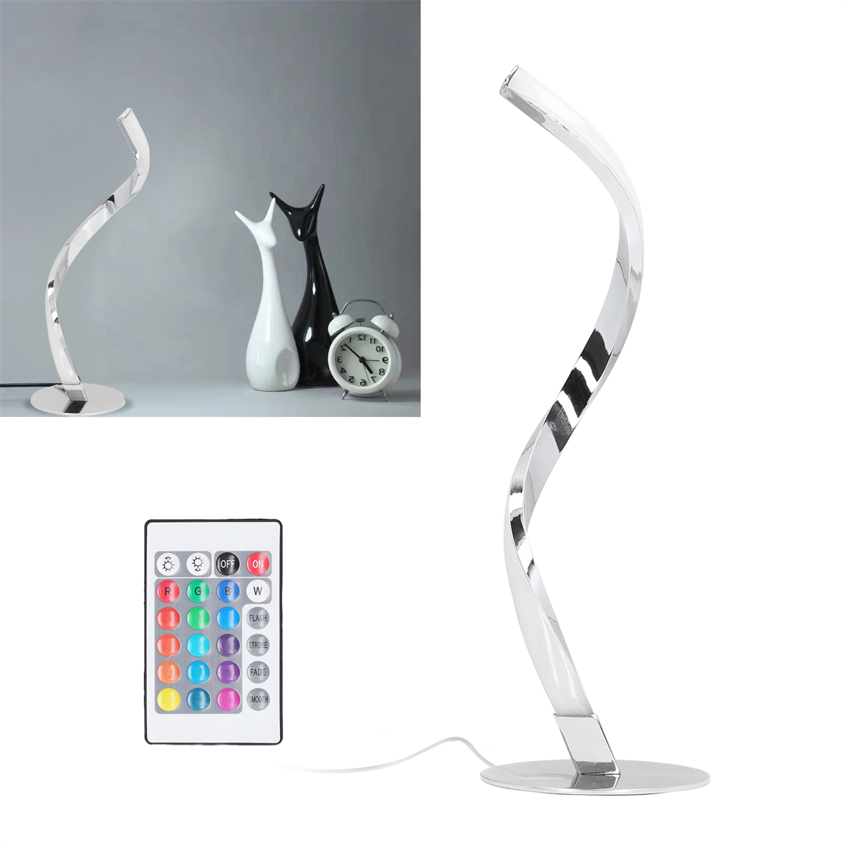 Silberne, geschwungene Lampe mit weißem Fuß und Fernbedienung. Zwei schwarz-weiße Katzenvasen im Hintergrund.
