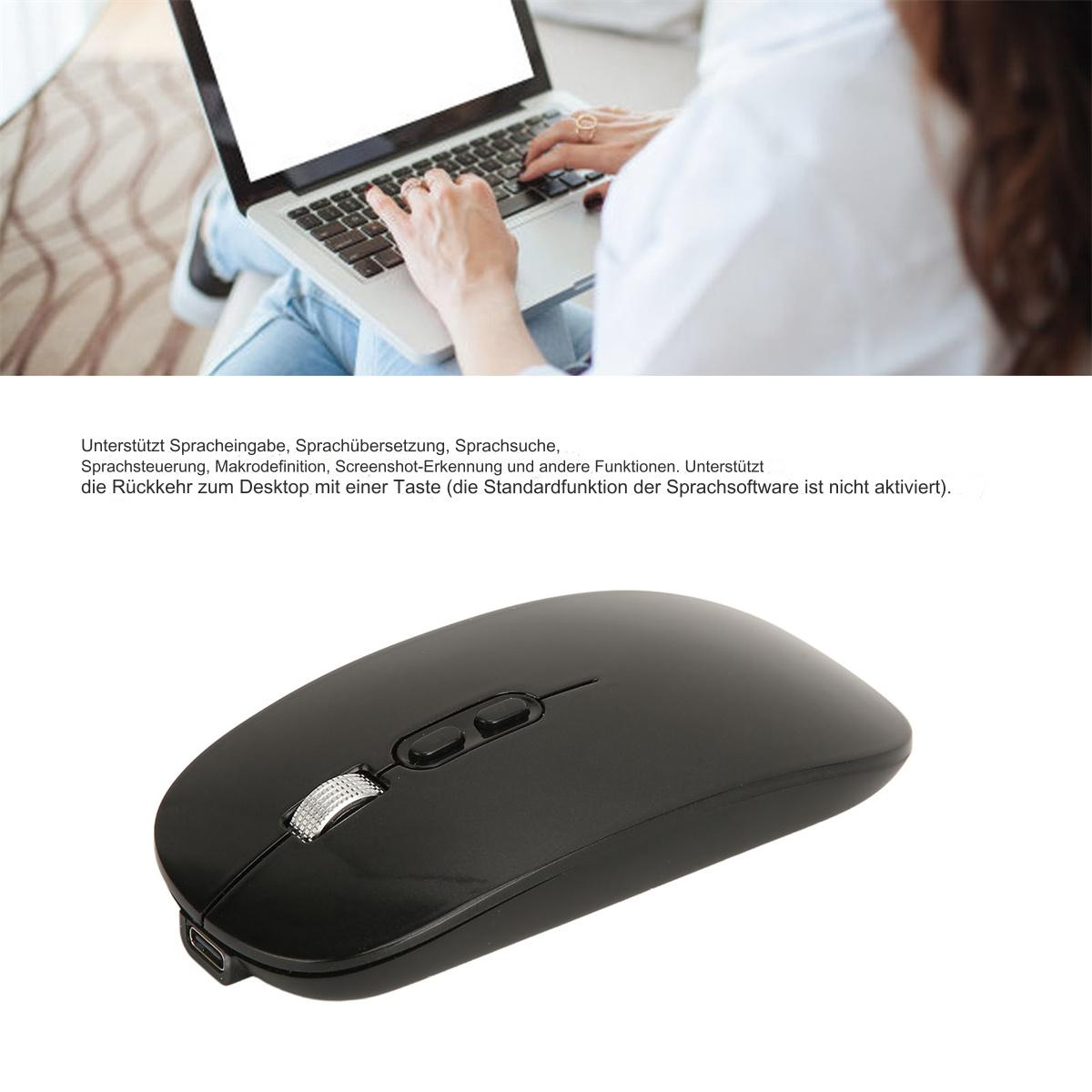 Eine schwarze, kabellose Maus wird angezeigt. Eine Person tippt im Hintergrund auf einem Laptop.