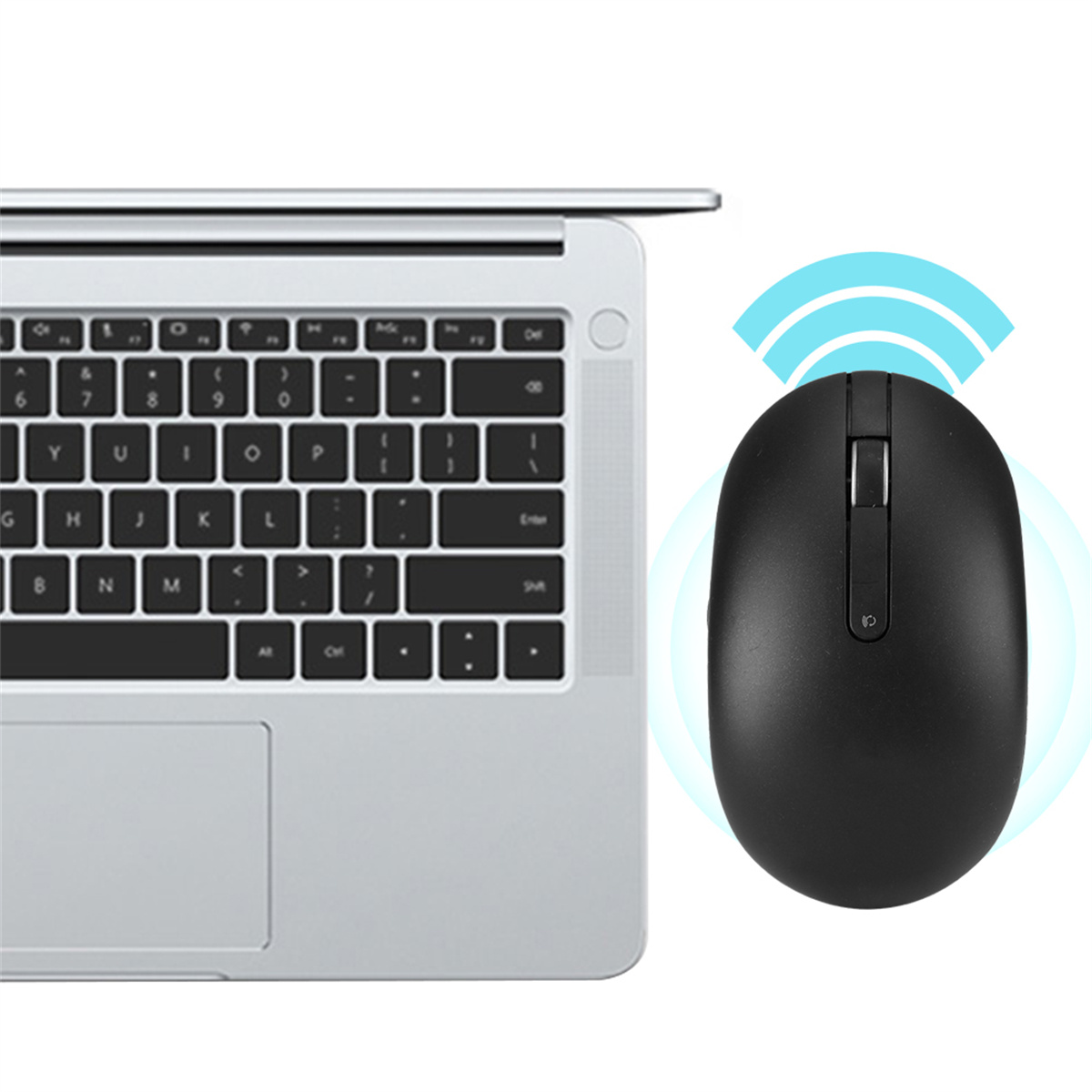 Schwarze kabellose Maus neben einem silbernen Laptop. Blaues Signalsymbol über der Maus.
