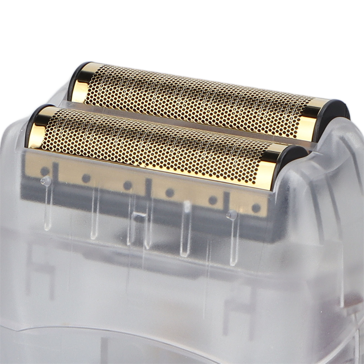 Nahaufnahme der goldfarbenen Klingen eines Elektrorasierers. In klarem Kunststoff.
