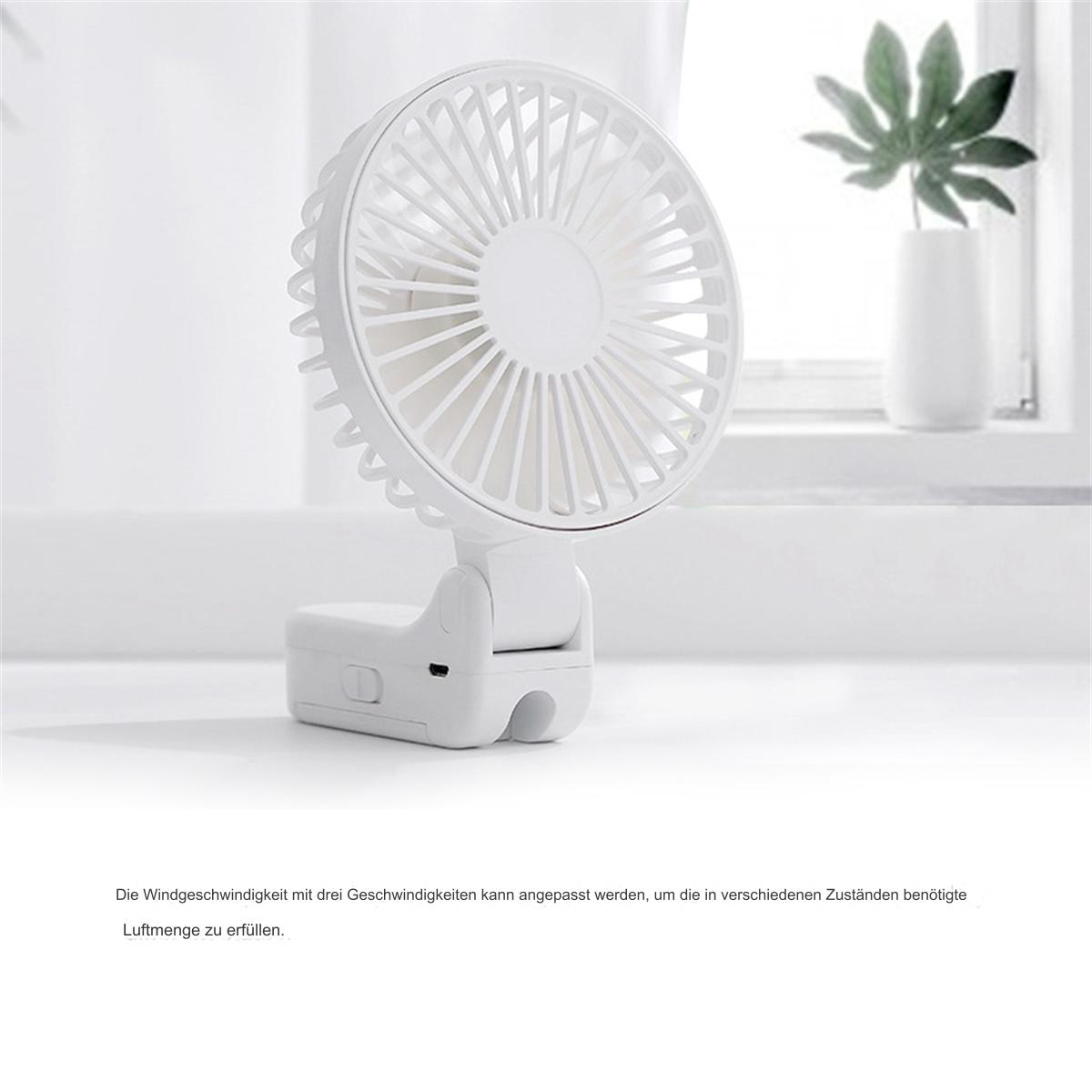 Weißer tragbarer Ventilator auf weißer Oberfläche, mit einer Pflanze im Hintergrund.
