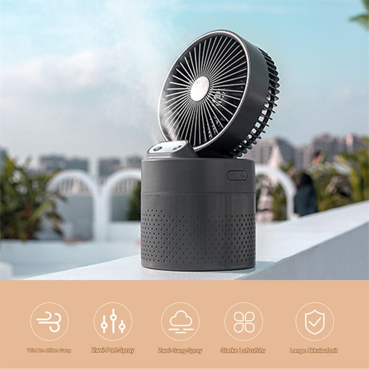 Schwarzer und grauer tragbarer Ventilator, der Nebel versprüht. Auf einer Mauer. Symbole für Wind, Sprühnebel, starken Luftstrom.