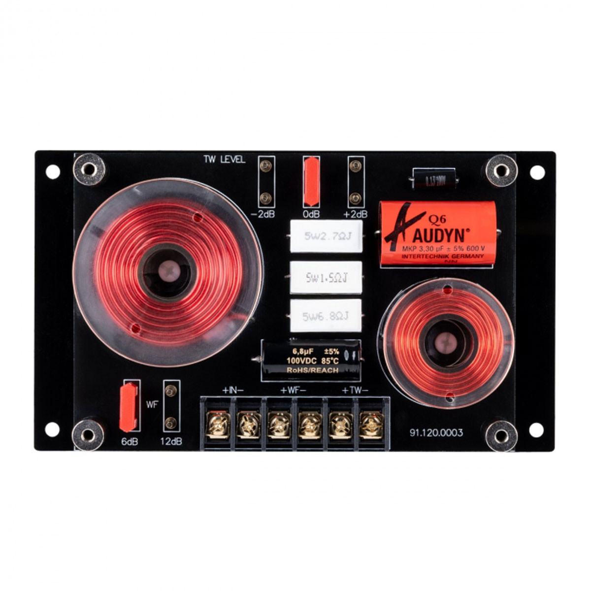 Schwarzes elektronisches Bauteil mit roten und kupferfarbenen Spulen und einem Etikett.