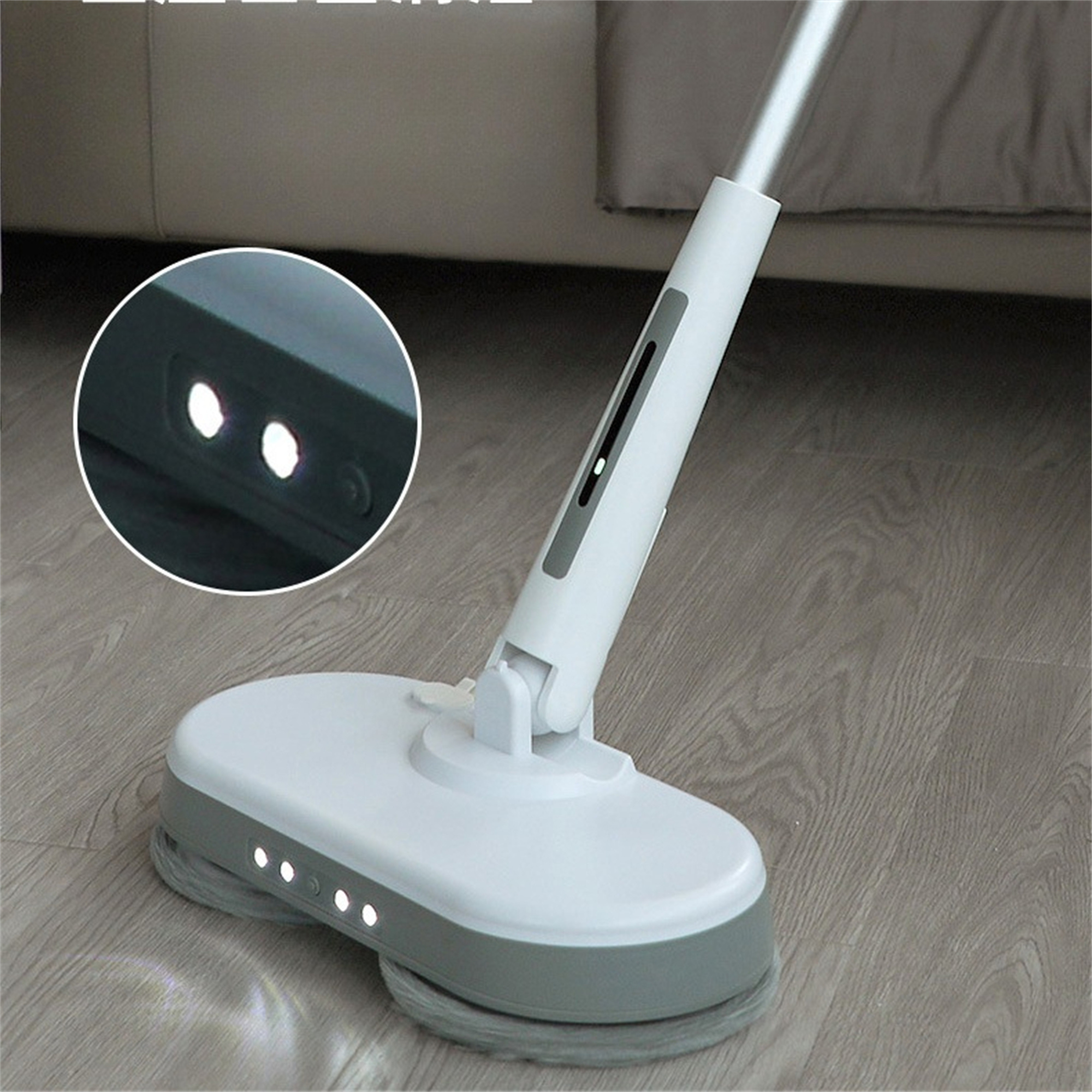Ein weiß-grauer Bodenreiniger mit Licht und Nahaufnahme des Lichts.