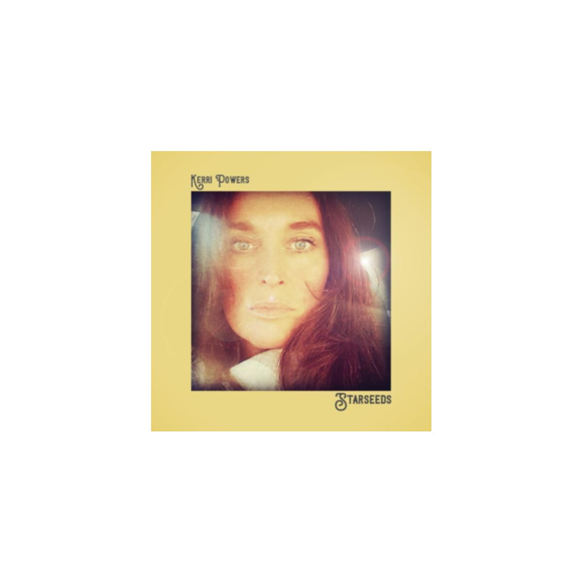 Pochette d'album avec le visage de Kerri Powers, les cheveux roux, et le titre est Starseeds.