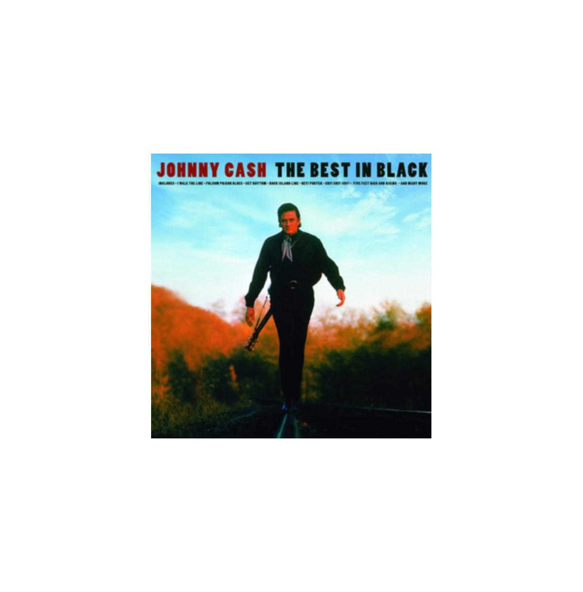 Albumhoes: Johnny Cash loopt op spoorrails, gitaar in de hand.