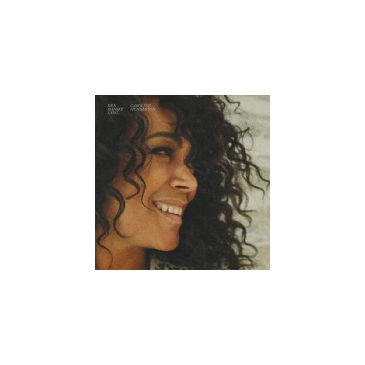 Pochette d'album avec le profil d'une femme souriante, cheveux foncés, et du texte.