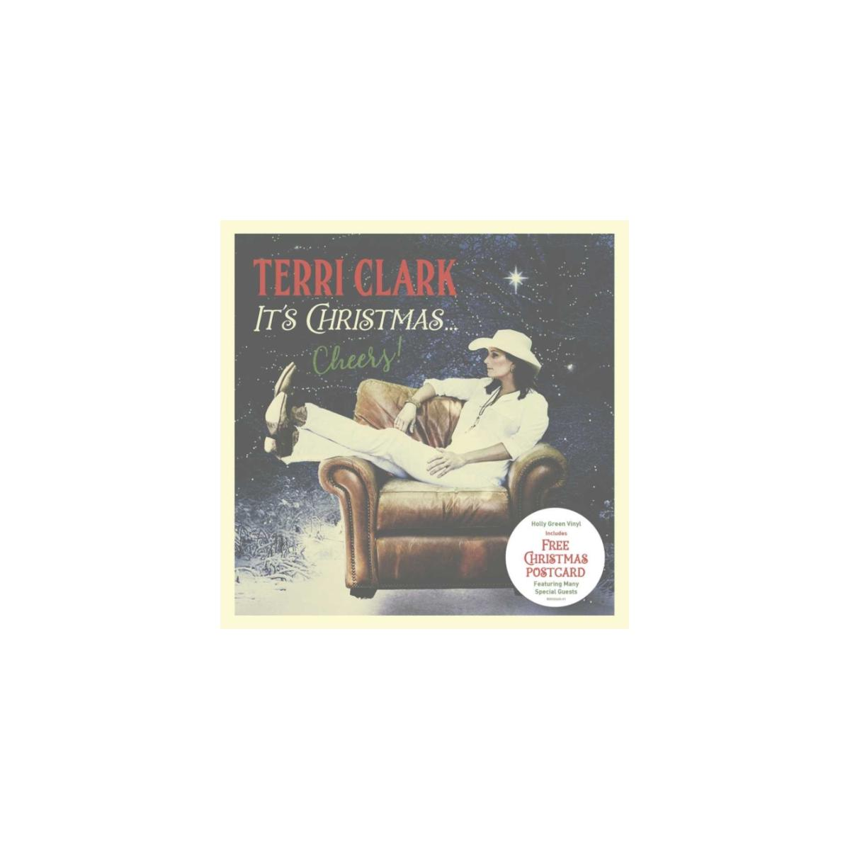 Pochette d'album avec Terri Clark assise sur un canapé dans un cadre de Noël.