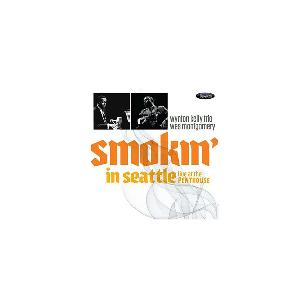Couverture d'album. Deux photos en noir et blanc de musiciens, le titre 'Smokin' in Seattle' et les noms des artistes.