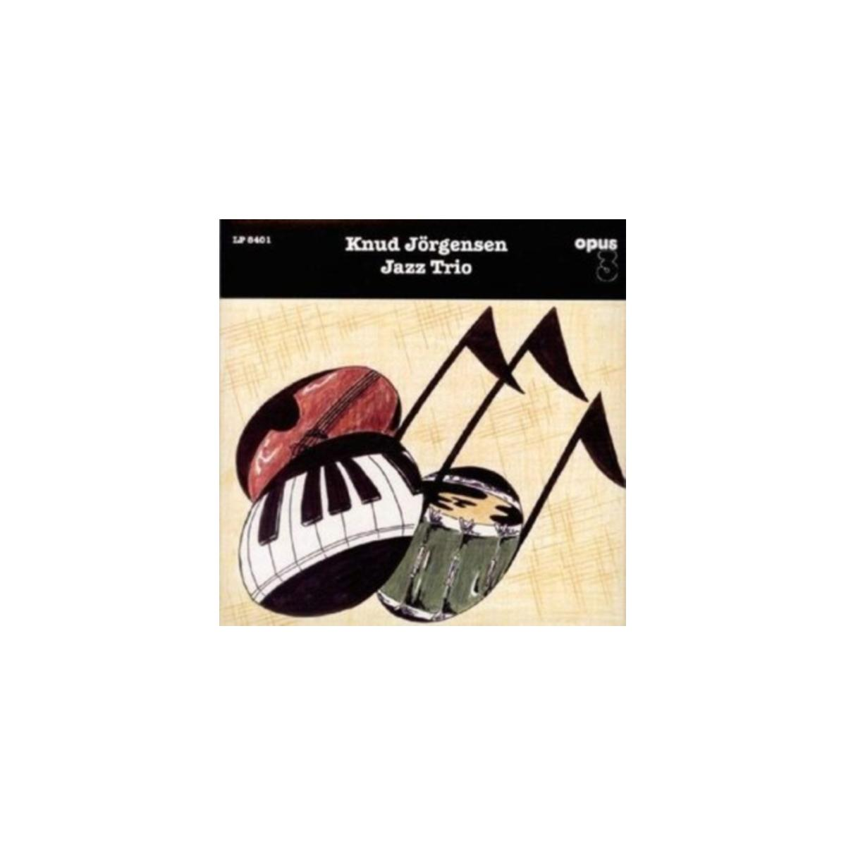 Albumhoes met muziekinstrumenten: gitaar, pianotoetsen en een drum, met muzieknoten.