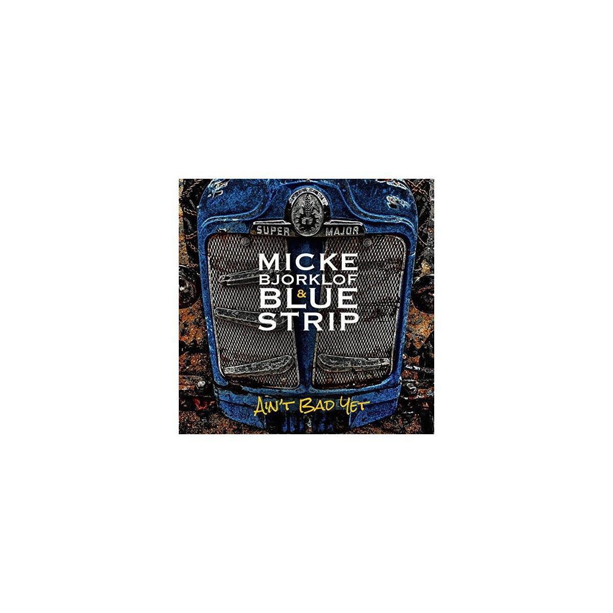 Albumhoes: Blauwe en zilveren vintage autogrille met de titel 'Micke Bjorklof & Blue Strip'.