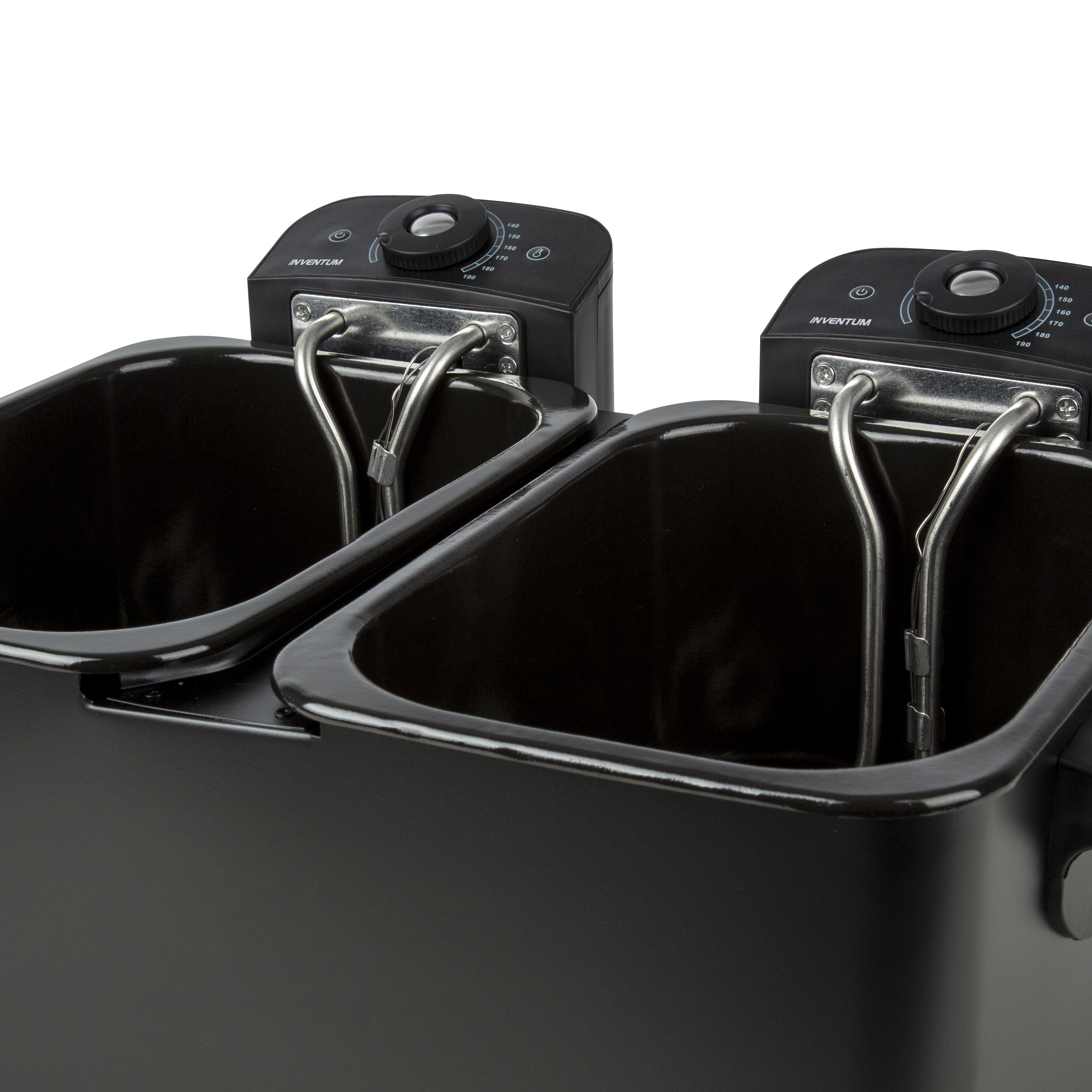 Image of two black deep fryers with control knobs.