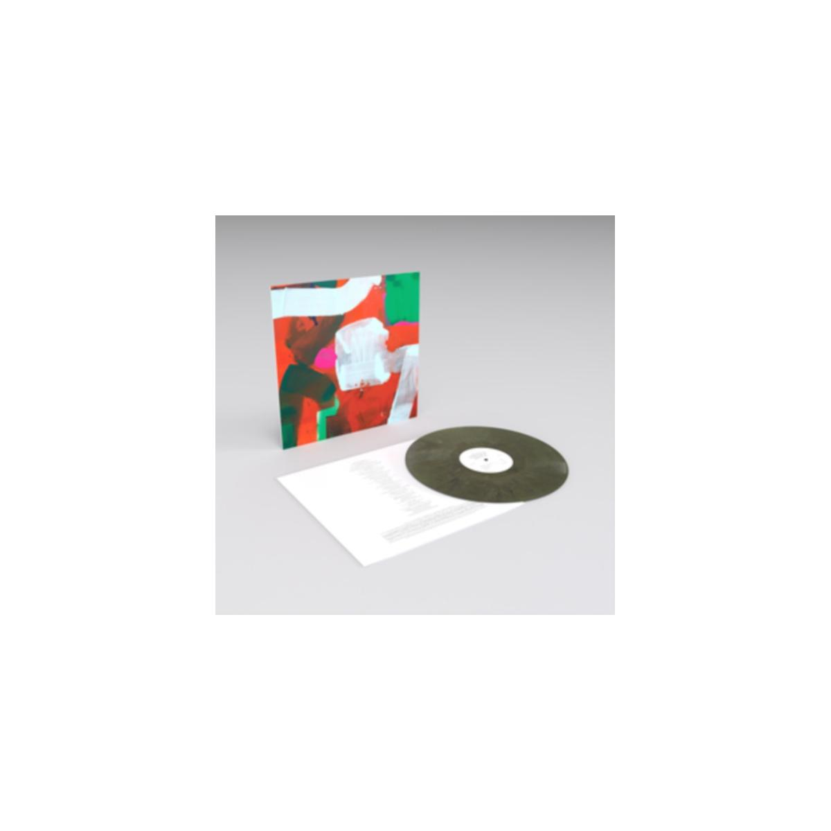 Un vinile con copertina astratta verde e bianca, con disco verde.
