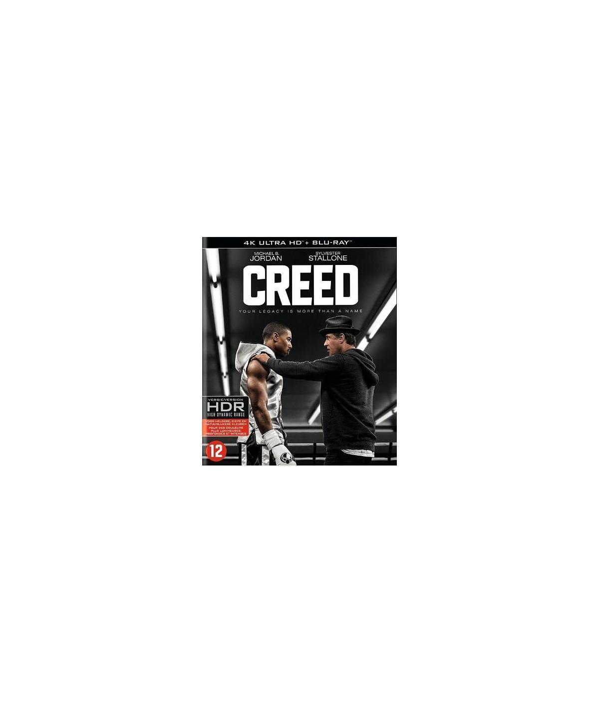 Couverture DVD pour Creed. Comprend deux hommes boxant, un au premier plan. Noir et blanc.