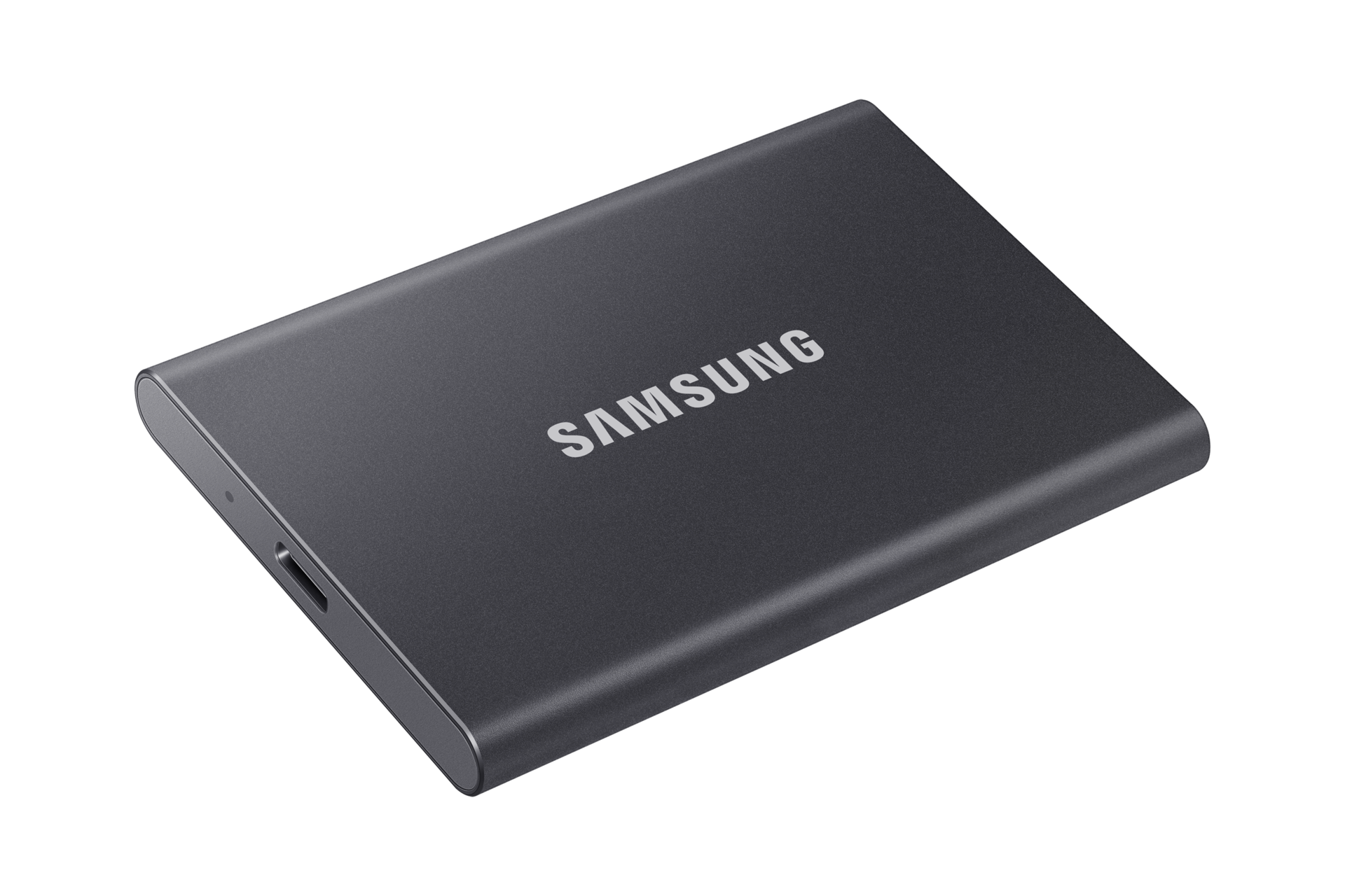 Eine schwarze externe Festplatte von Samsung auf schwarzem Hintergrund.