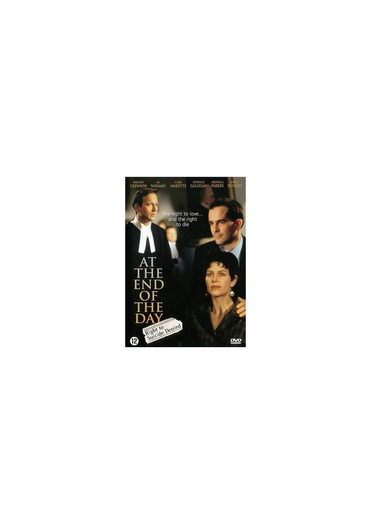 De 'At the End of the Day' dvd-hoes toont drie mensen in pakken en een vrouw. Tekst op de hoes.